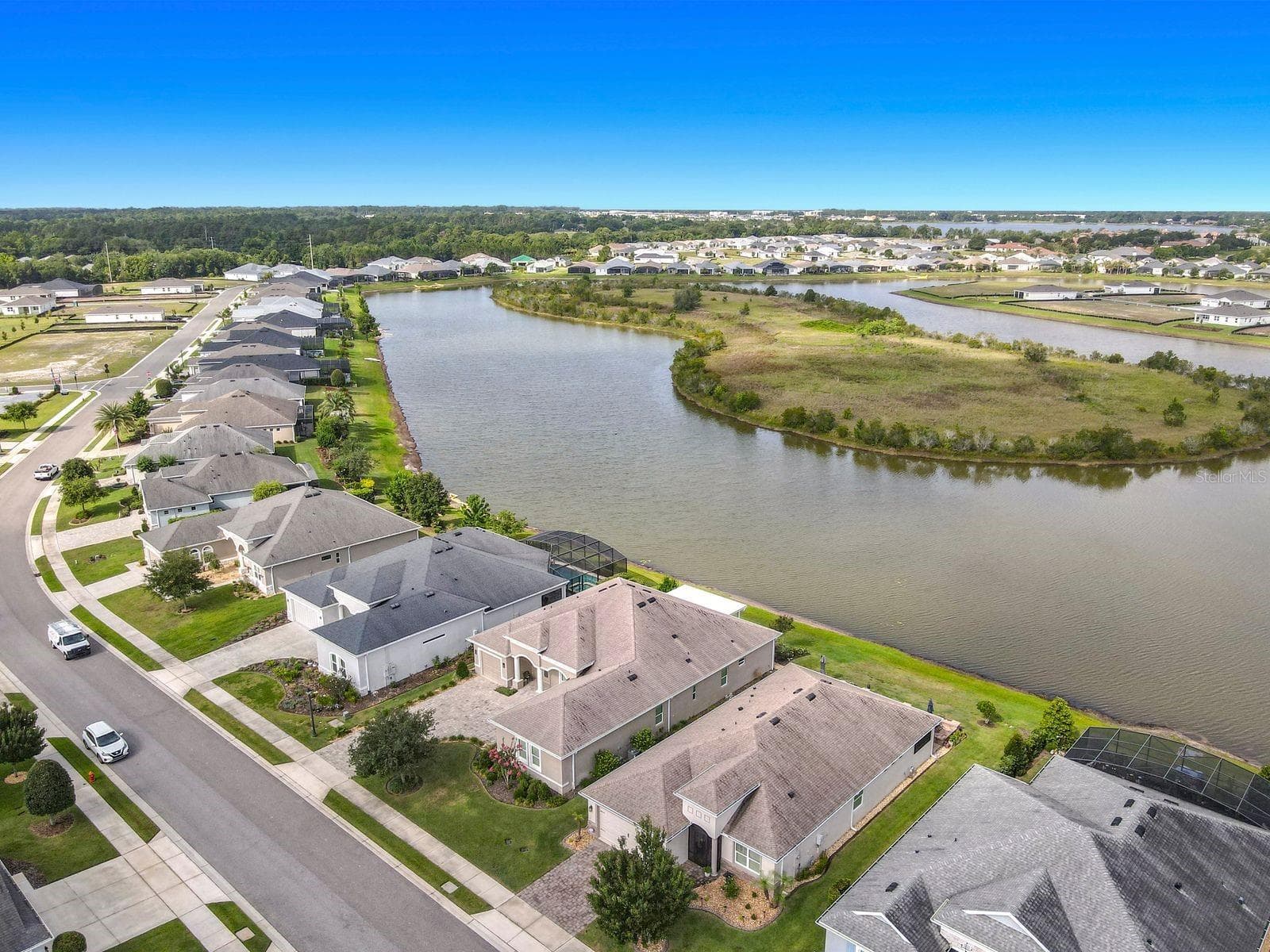 Lanai overlooks Island and Lake - 8461 BRIDGEPORT BAY CIR, MOUNT DORA