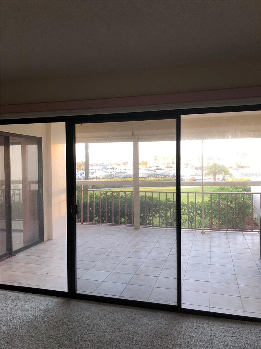 Balcony off Primary Bedroom - 7907 SAILBOAT KEY BLVD S #105, SOUTH PASADENA