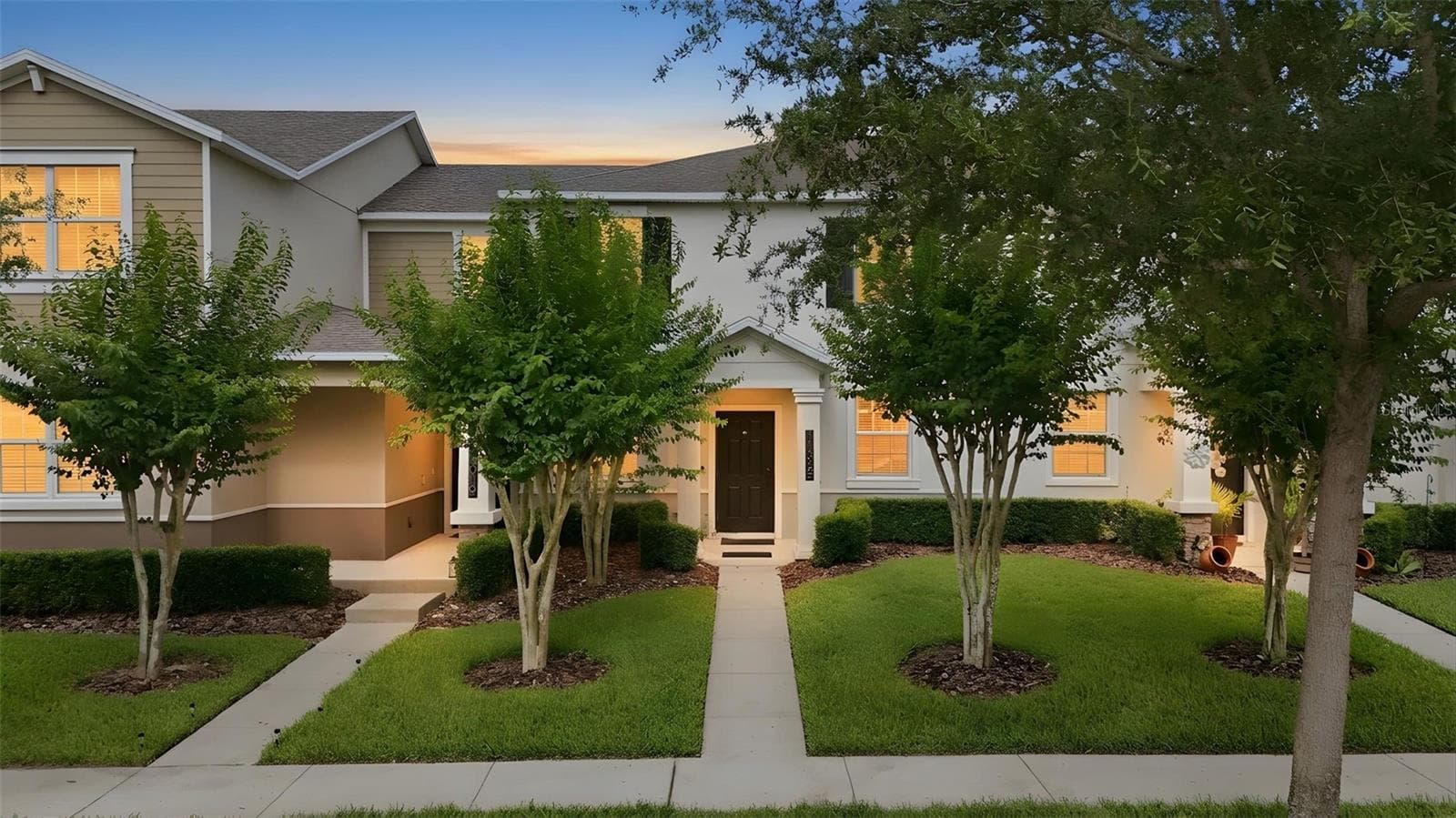 Front at Twilight - 11025 SUSPENSE DR, WINTER GARDEN