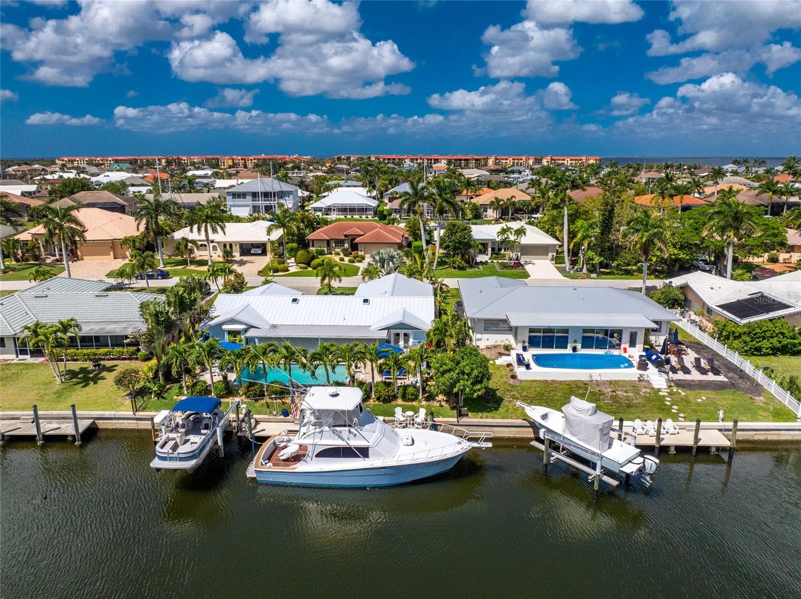 80 Ft Water-frontage. 46 Ft Dock, 8ft Finger dock, 10K Boat Lift -Designed for the avid boater - 80 SABAL DR, PUNTA GORDA