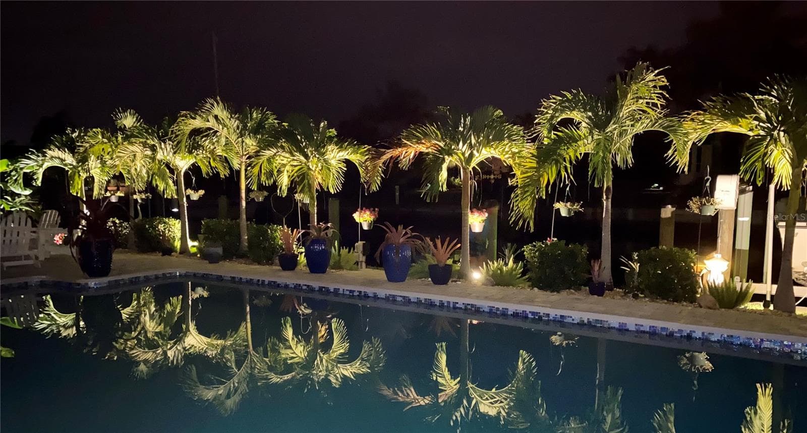 An enchanting backdrop for all occasions, set in your own palm-studded sanctuary. - 80 SABAL DR, PUNTA GORDA