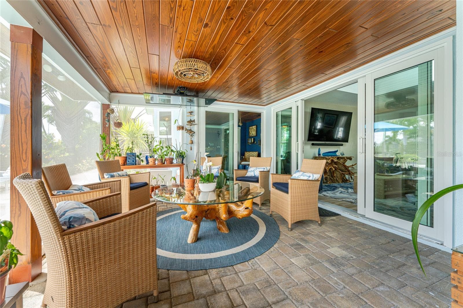 This resin composite plank ceiling brings warmth and weatherproof elegance . - 80 SABAL DR, PUNTA GORDA