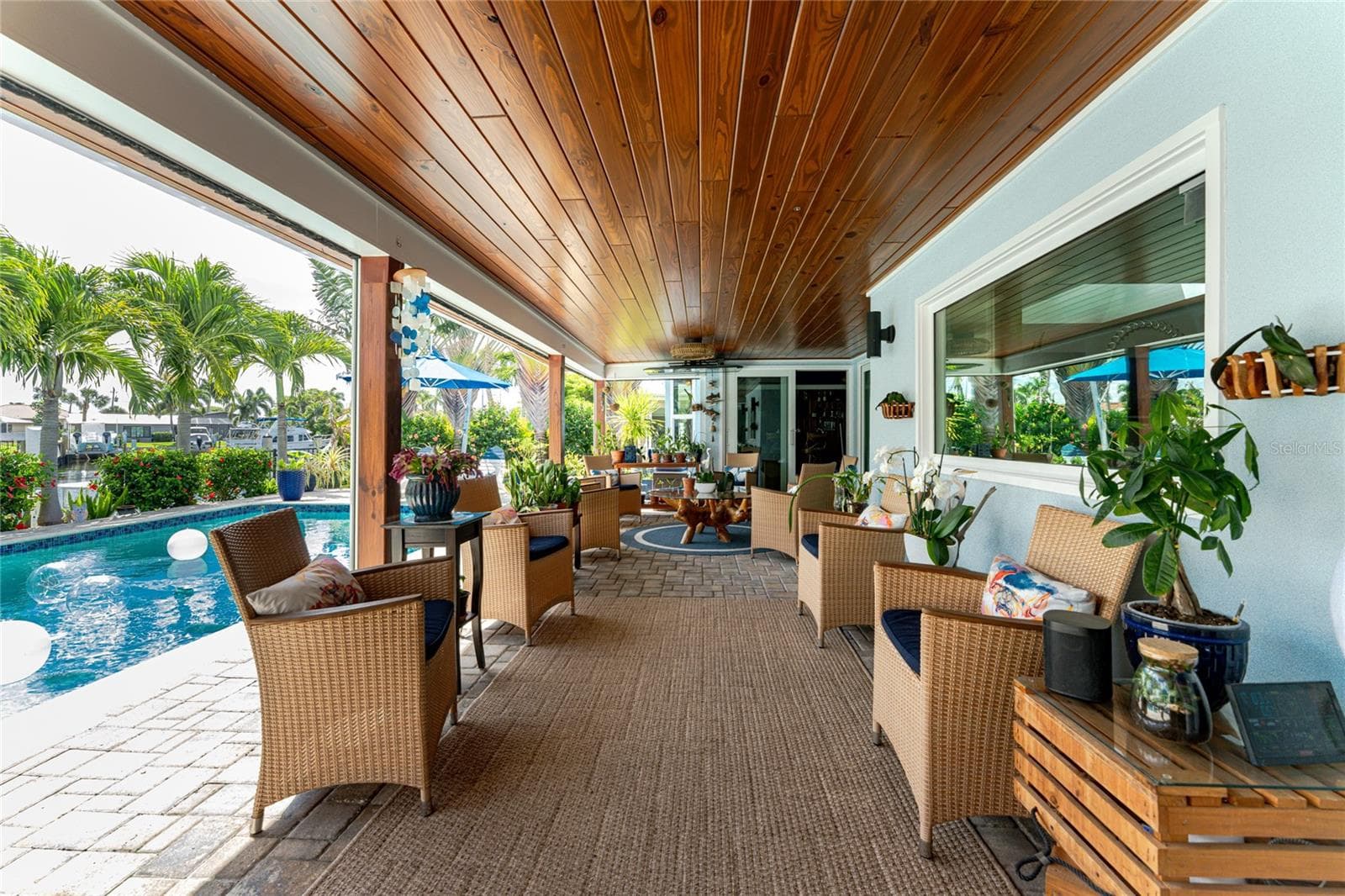 This  paver deck  completes this enchanting tropical space. - 80 SABAL DR, PUNTA GORDA