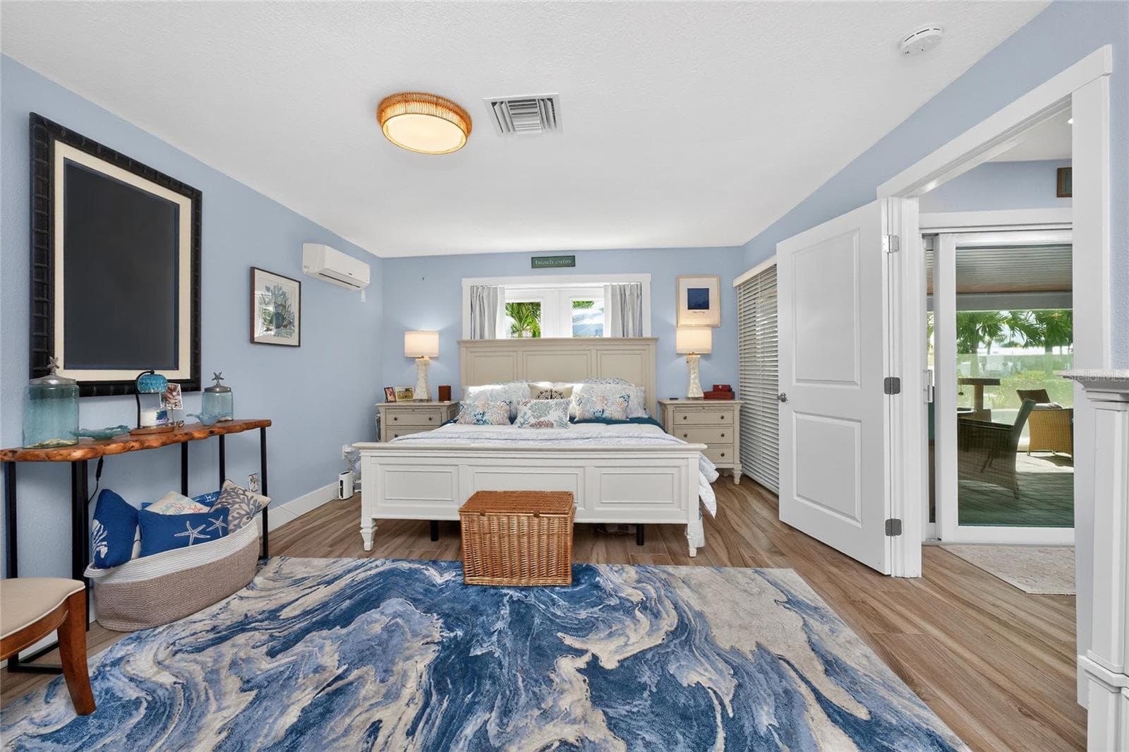 A serene coastal master ensuite designed for slow mornings and restful nights - 80 SABAL DR, PUNTA GORDA