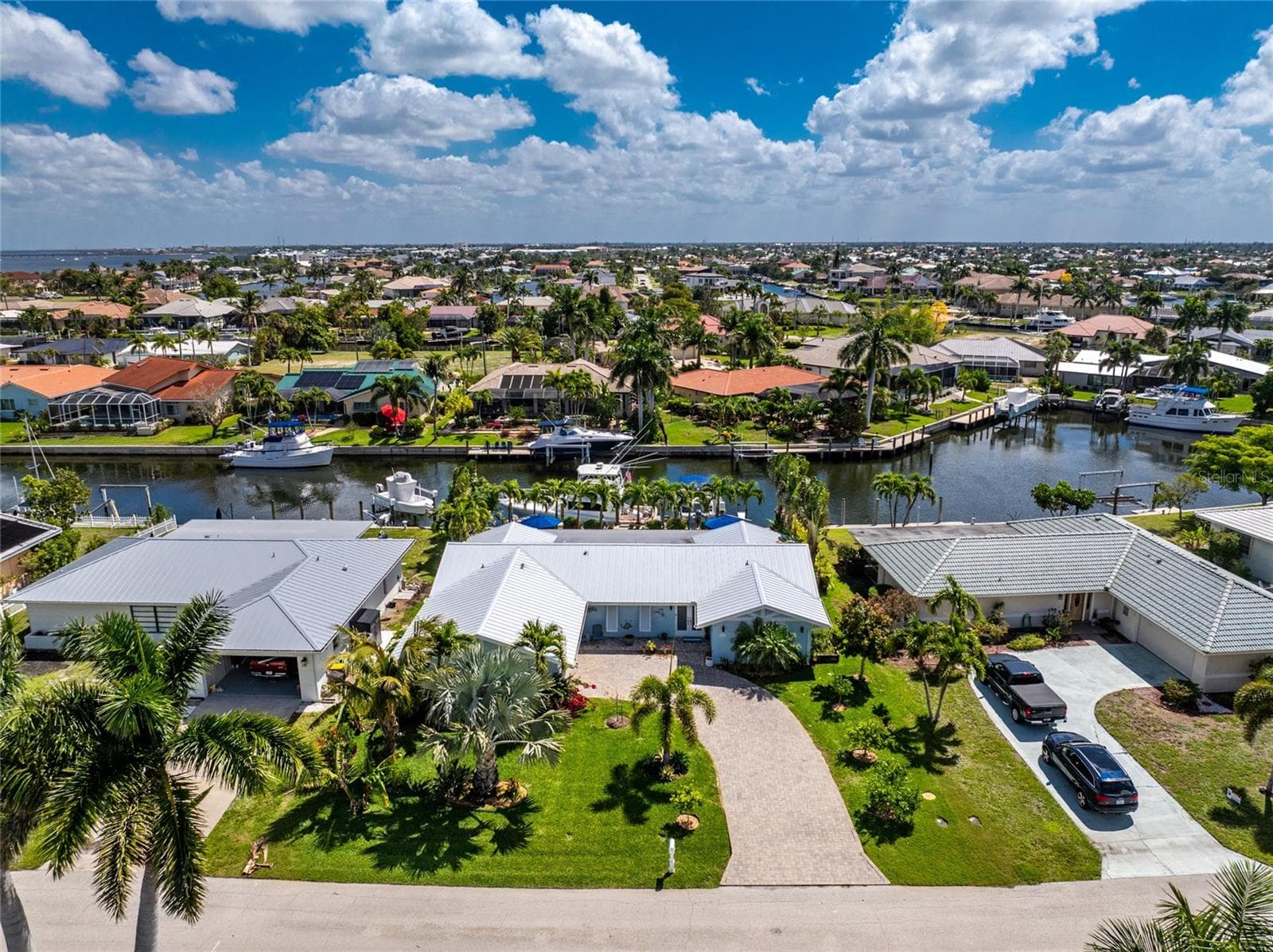 Standing Seam Aluminum Powder - Treated Metal Roof- Expansive Paver Driveway - 80 SABAL DR, PUNTA GORDA
