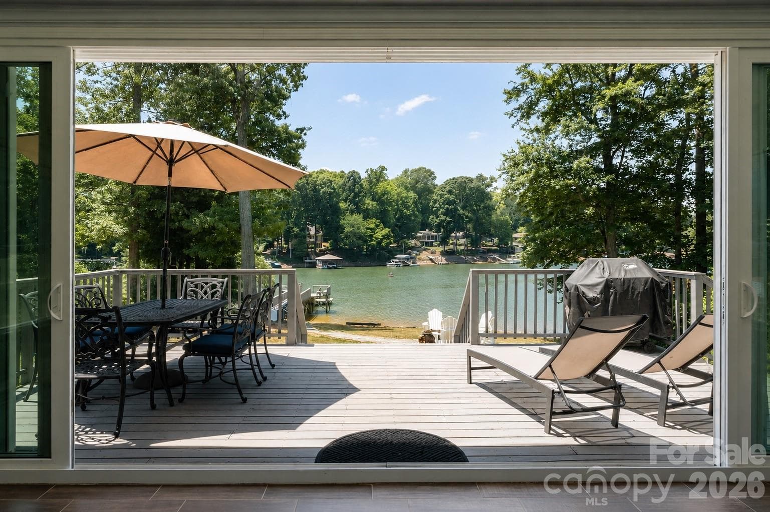 Experience the best of indoor outdoor living at this lakeside retreat in a prime Mooresville location! - Mooresville