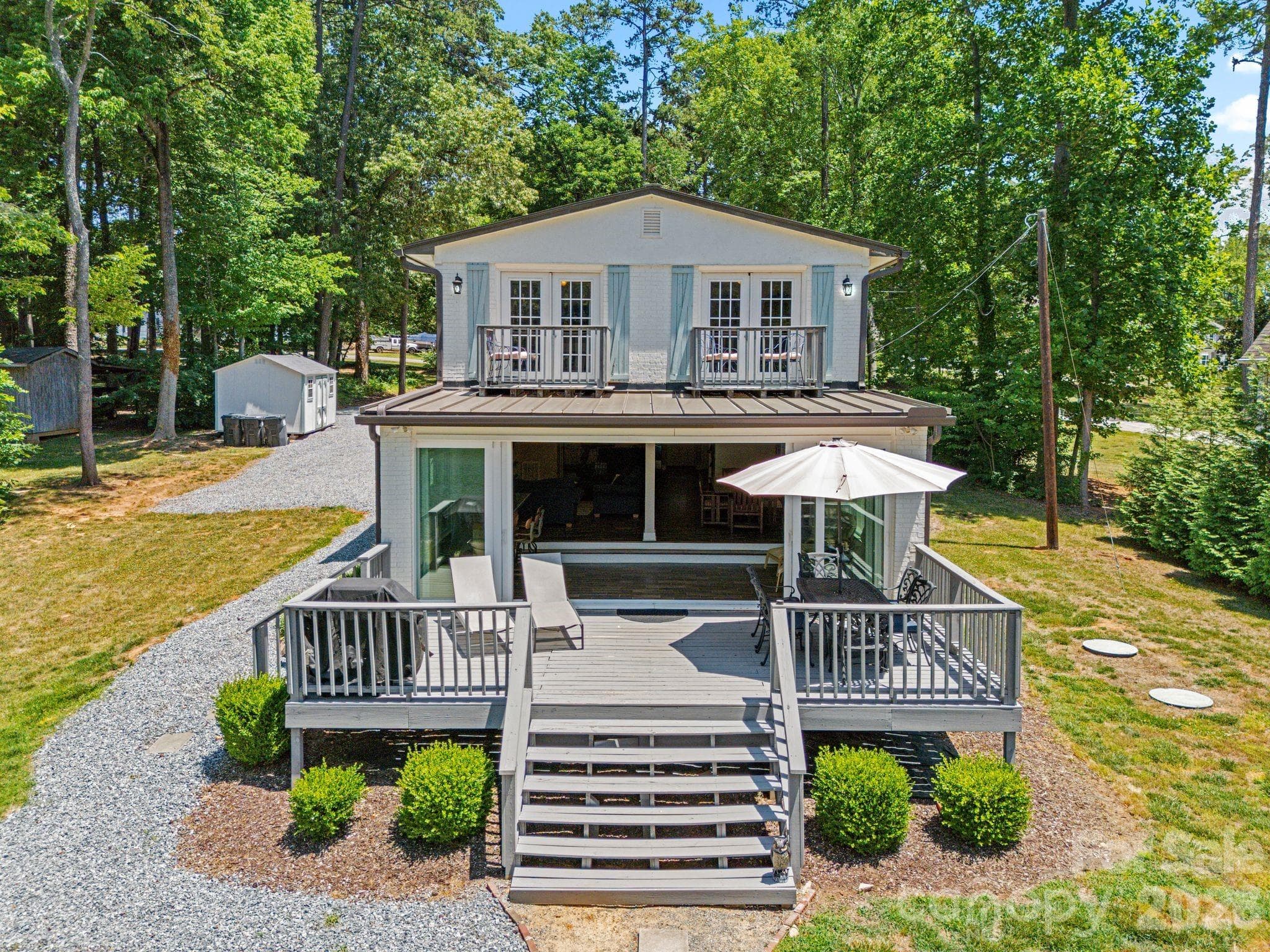 Expansive back deck adds to the ease outdoor enjoyment - Mooresville