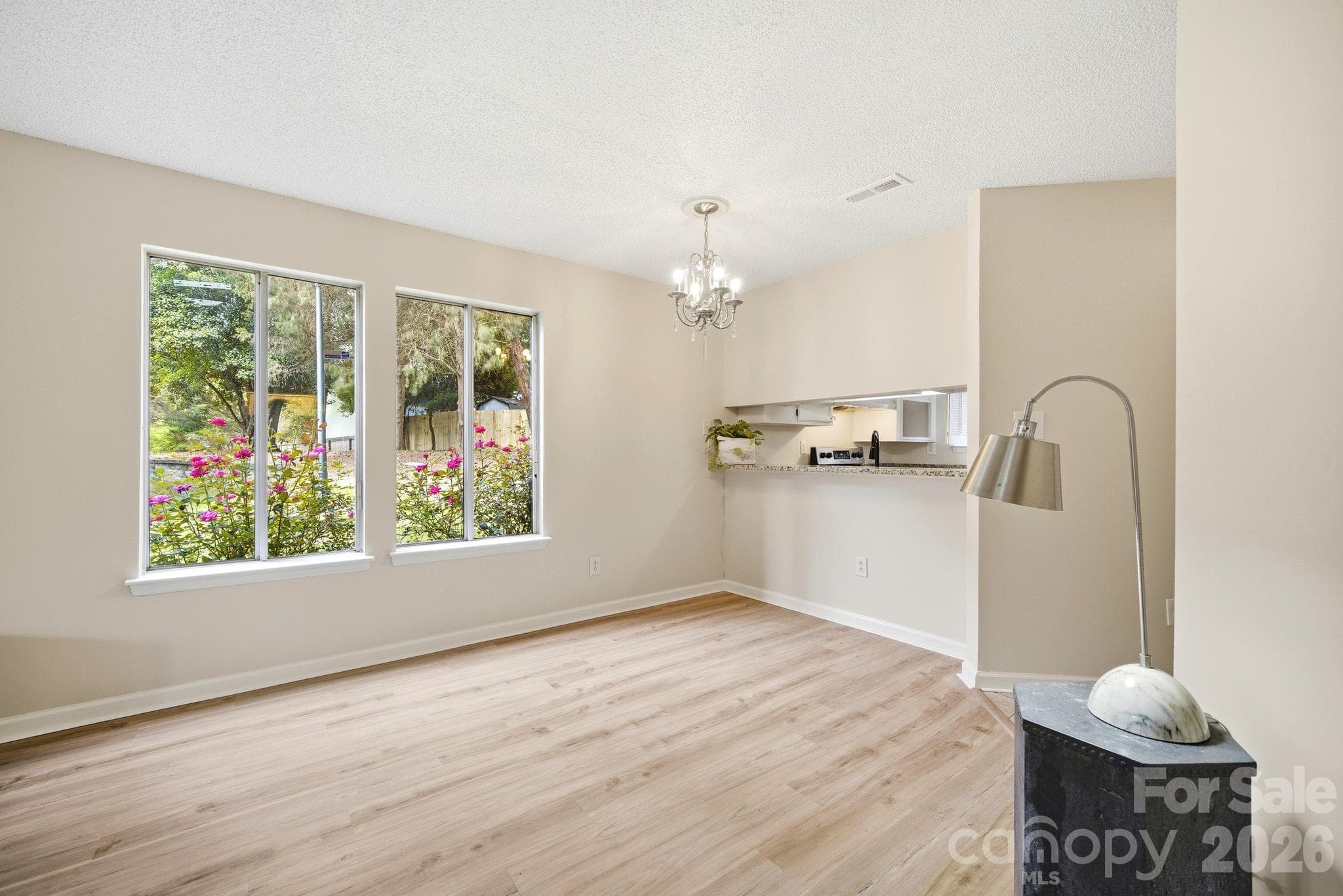 Diningroom space with lots of natural light flowing through - newer flooring - Charlotte