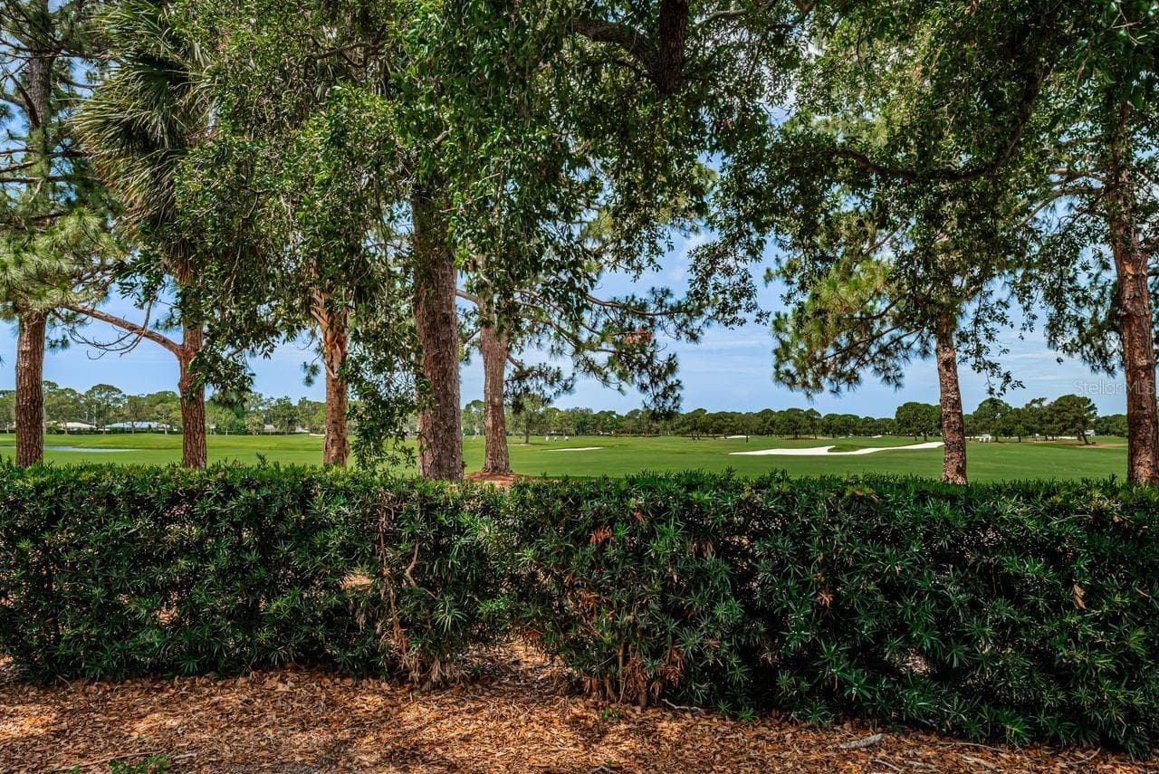 This home sits on the 17th hole of the Pelican Golf Club - 1704 CYPRESS AVE, BELLEAIR