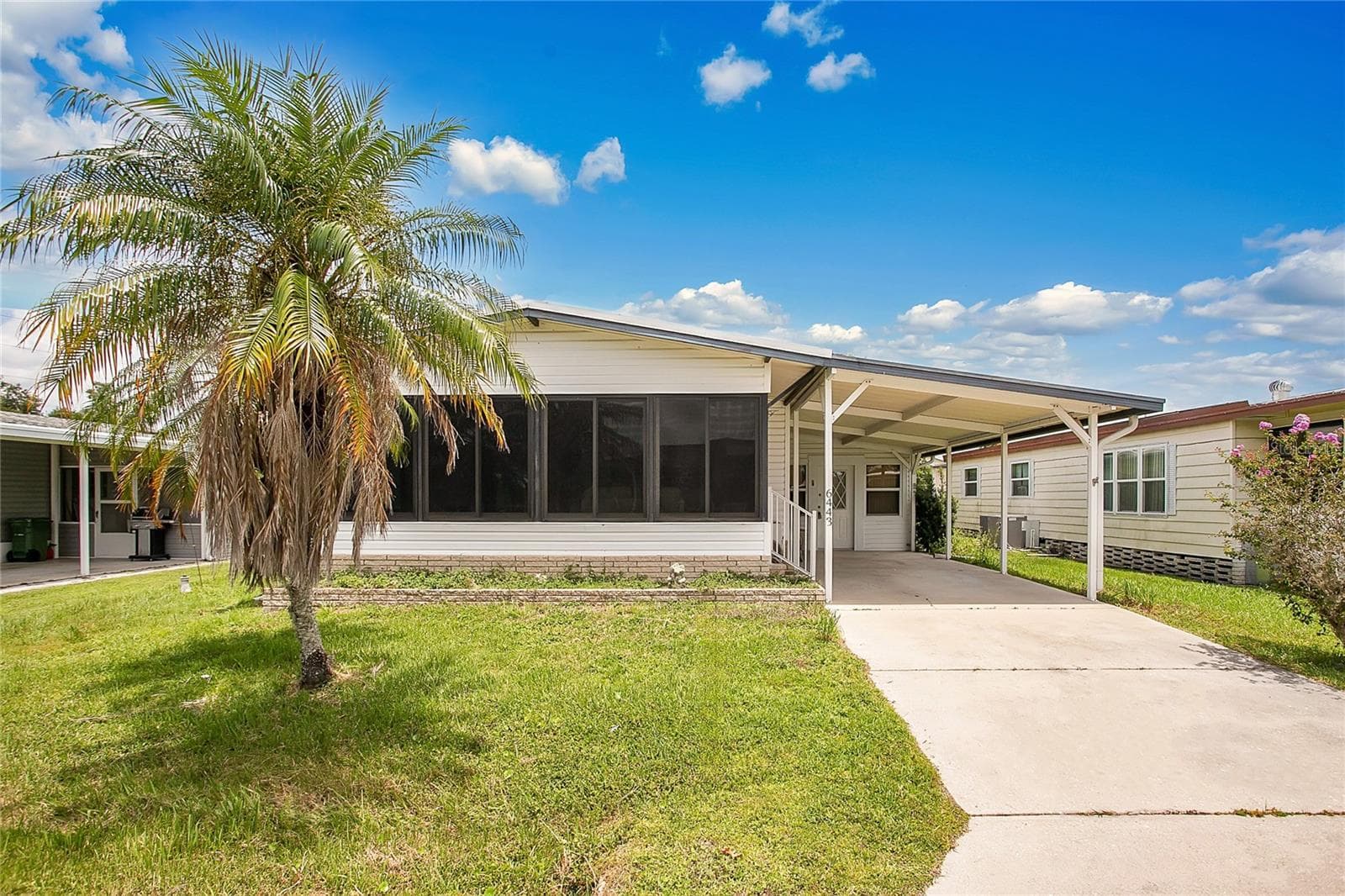 Manufactured Home at 6443 HOLLYBERRY LN NE, WINTER HAVEN, photo 2 of 38