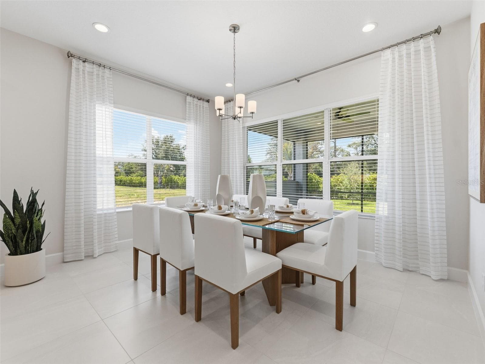 Exquisite Dining Space With Serene Outdoor Views - 3857 CABERNET TER, WESLEY CHAPEL