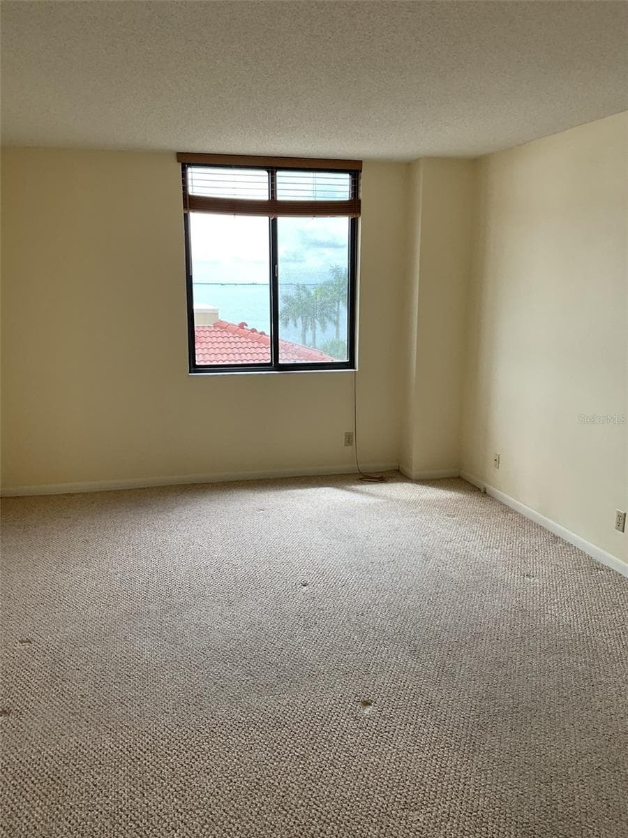 Primary BR has nice water view! - 6322 PALMA DEL MAR BLVD S #G402, ST PETERSBURG