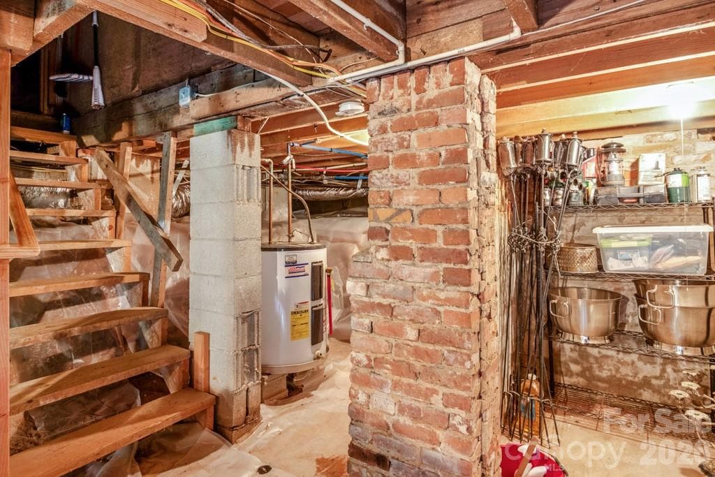 Stairs from first floor to basement. Root Cellar shown in this photo. - 75 Charles Street, Saluda