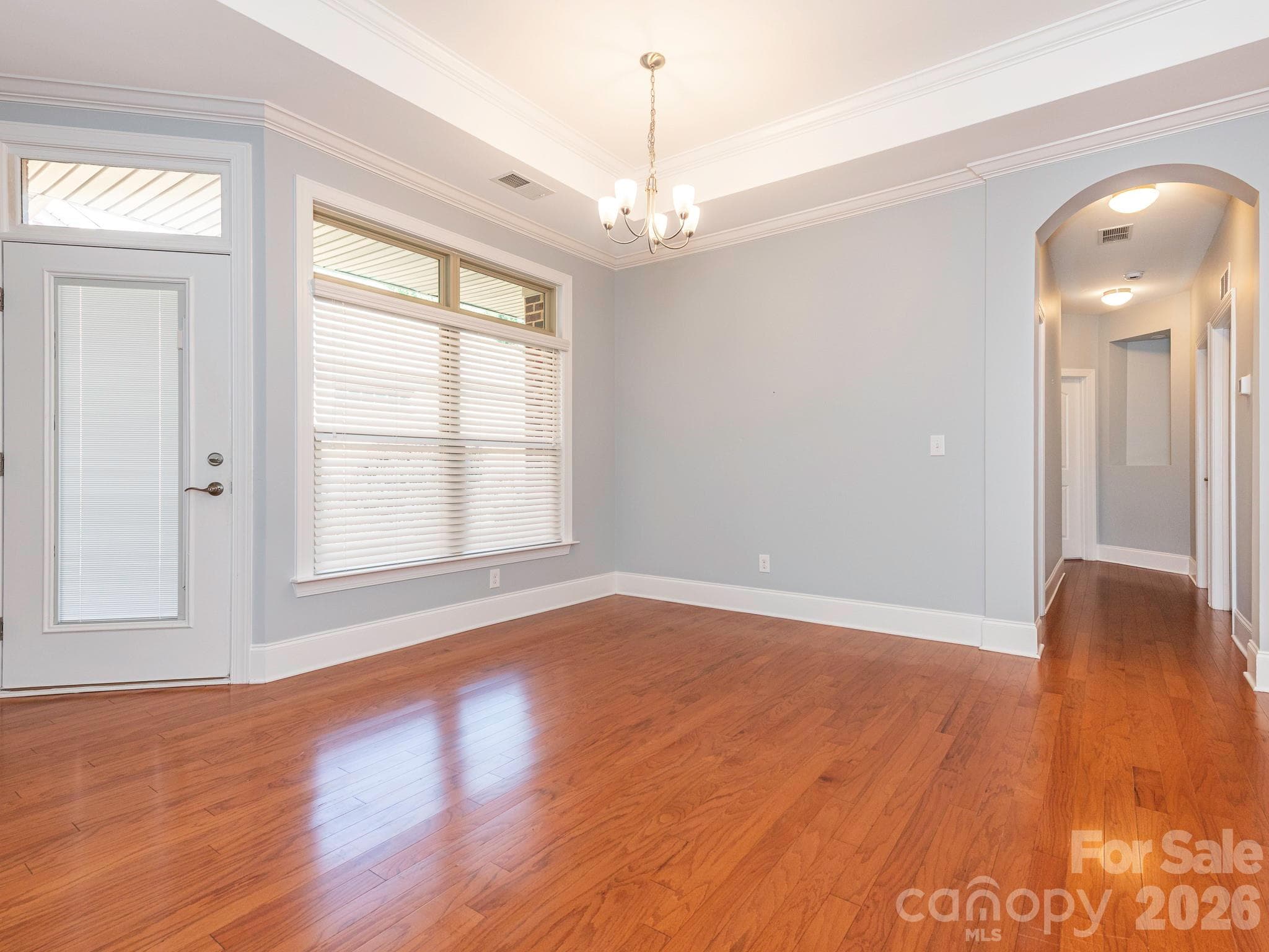 Large dining area is adjacent to the kitchen.  The door on the left leads to the patio. - 4534 Ideal Way, Harrisburg