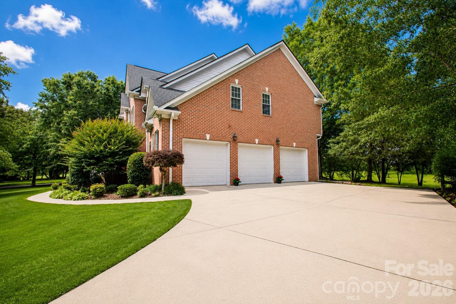 Extra large 3 car garage. - Matthews