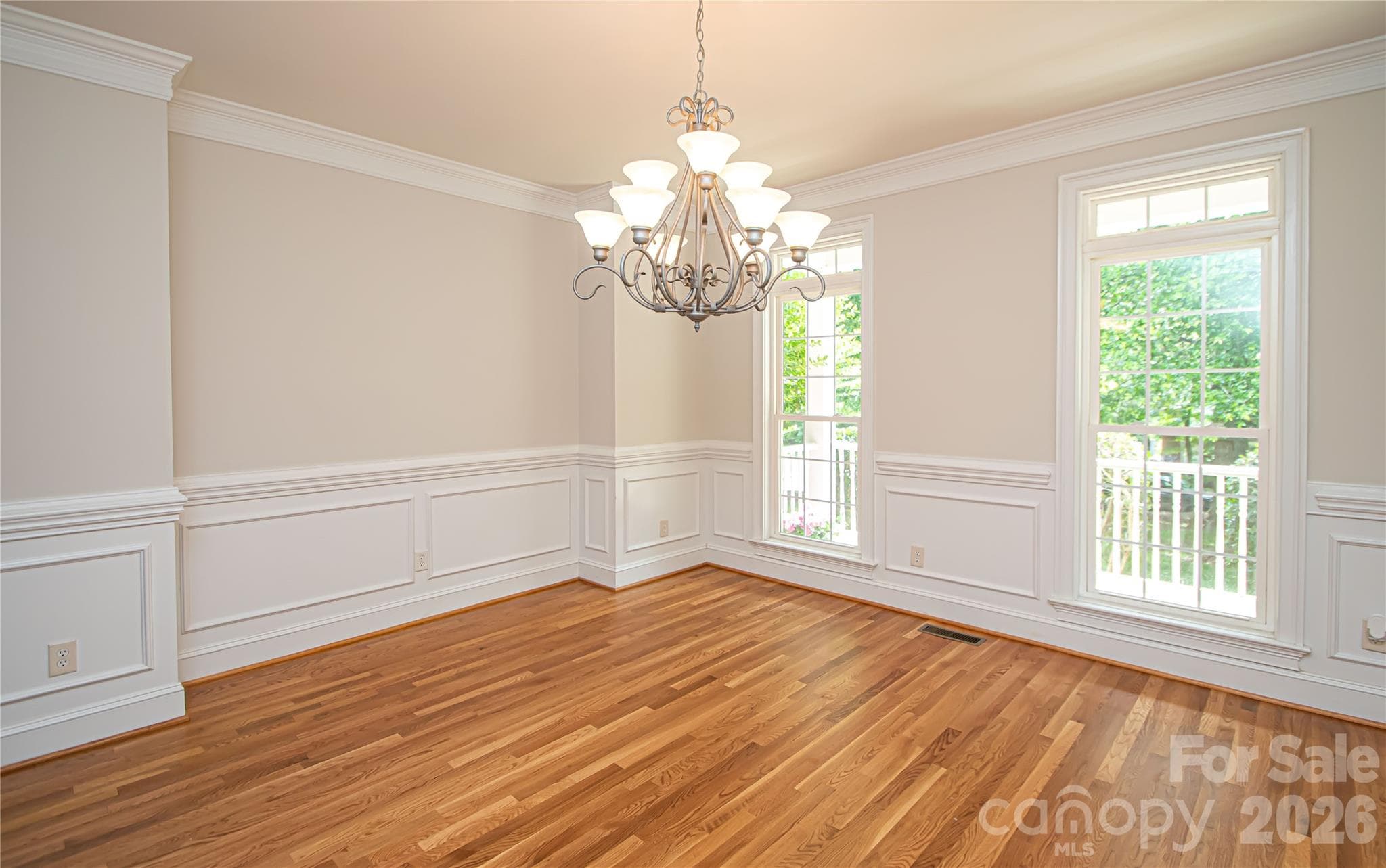 Very spacious dinning room large enough for 10-12 chairs. - Matthews