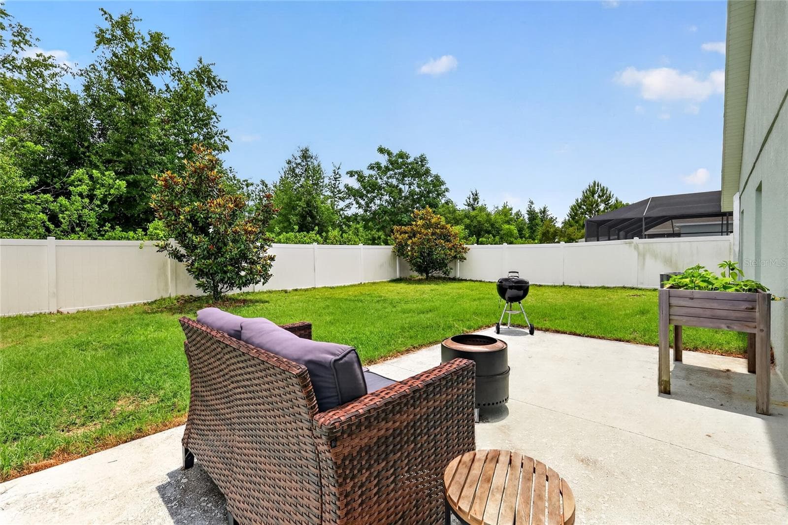 Rear Patio with Large Fenced Yard and Room For a Pool! - 12591 NE 49TH DR, OXFORD
