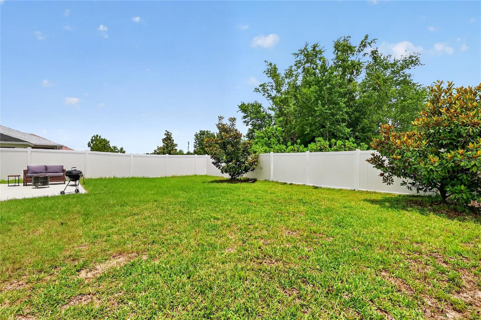 Rear Patio with Large Fenced Yard and Room For a Pool! - 12591 NE 49TH DR, OXFORD
