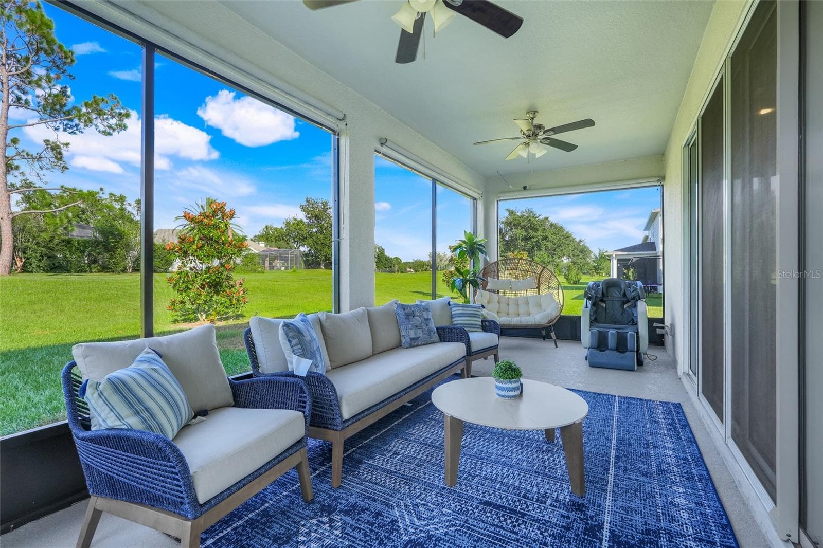 Huge lenai with out door kitchen hookups - 10169 SPRING LAKE DR, CLERMONT