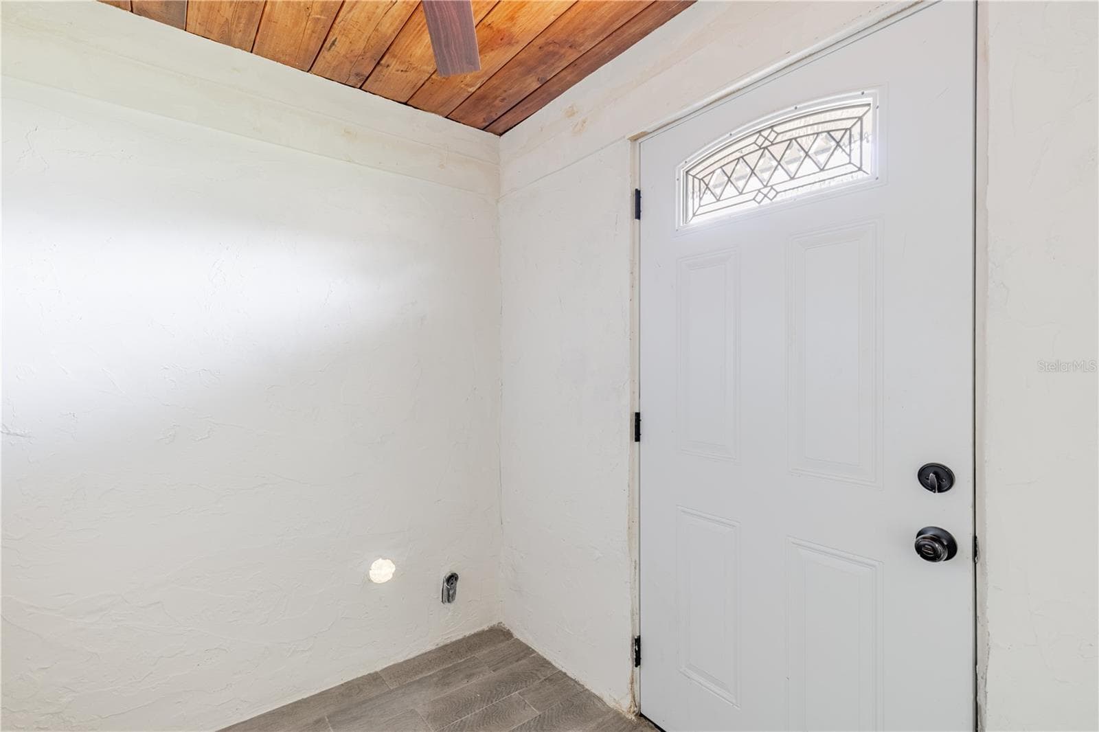 Rear exit through laundry room - 7020 SCOTT AVE, MOUNT DORA