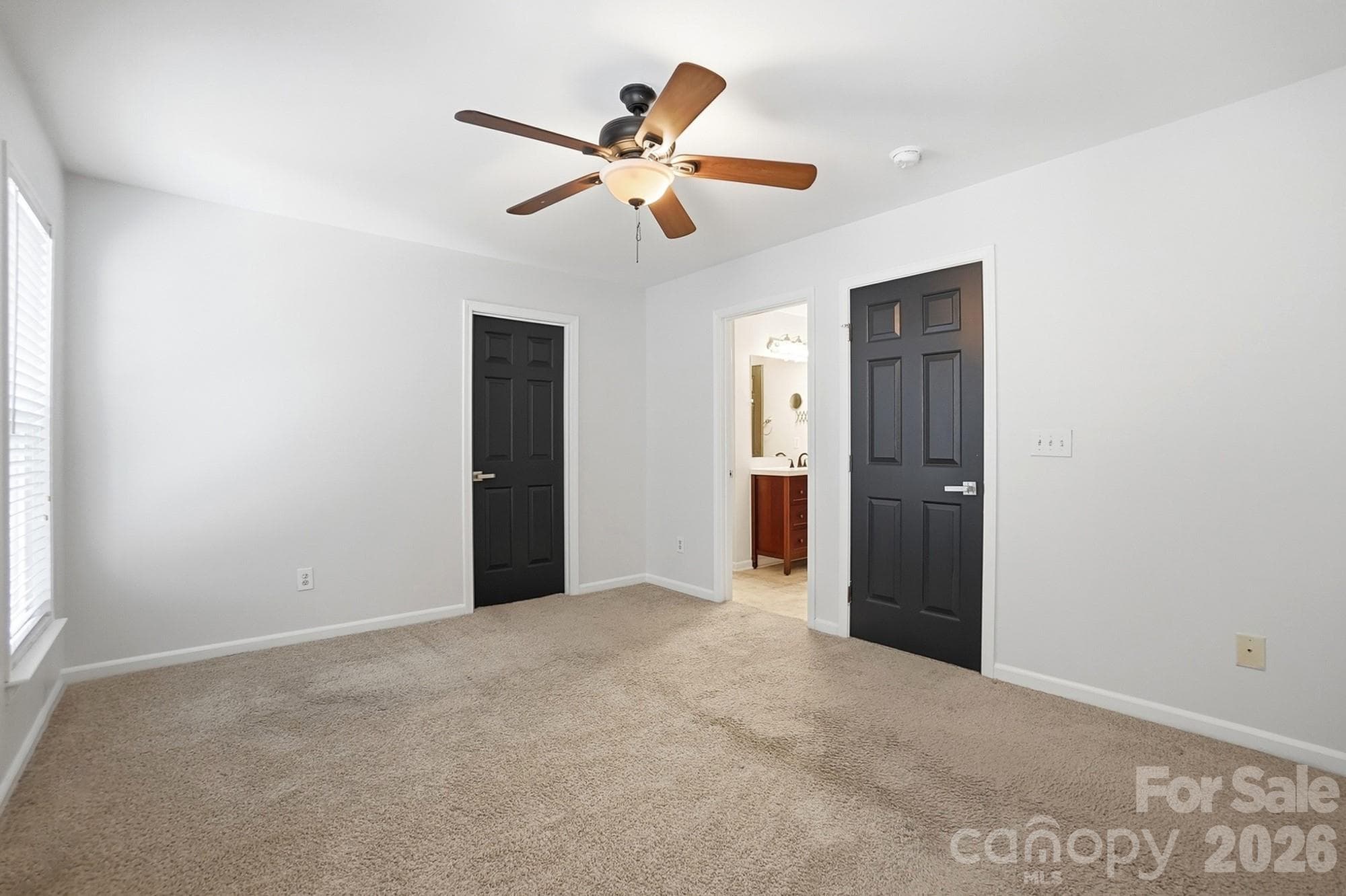 Primary Bedroom with access to bathroom - Charlotte