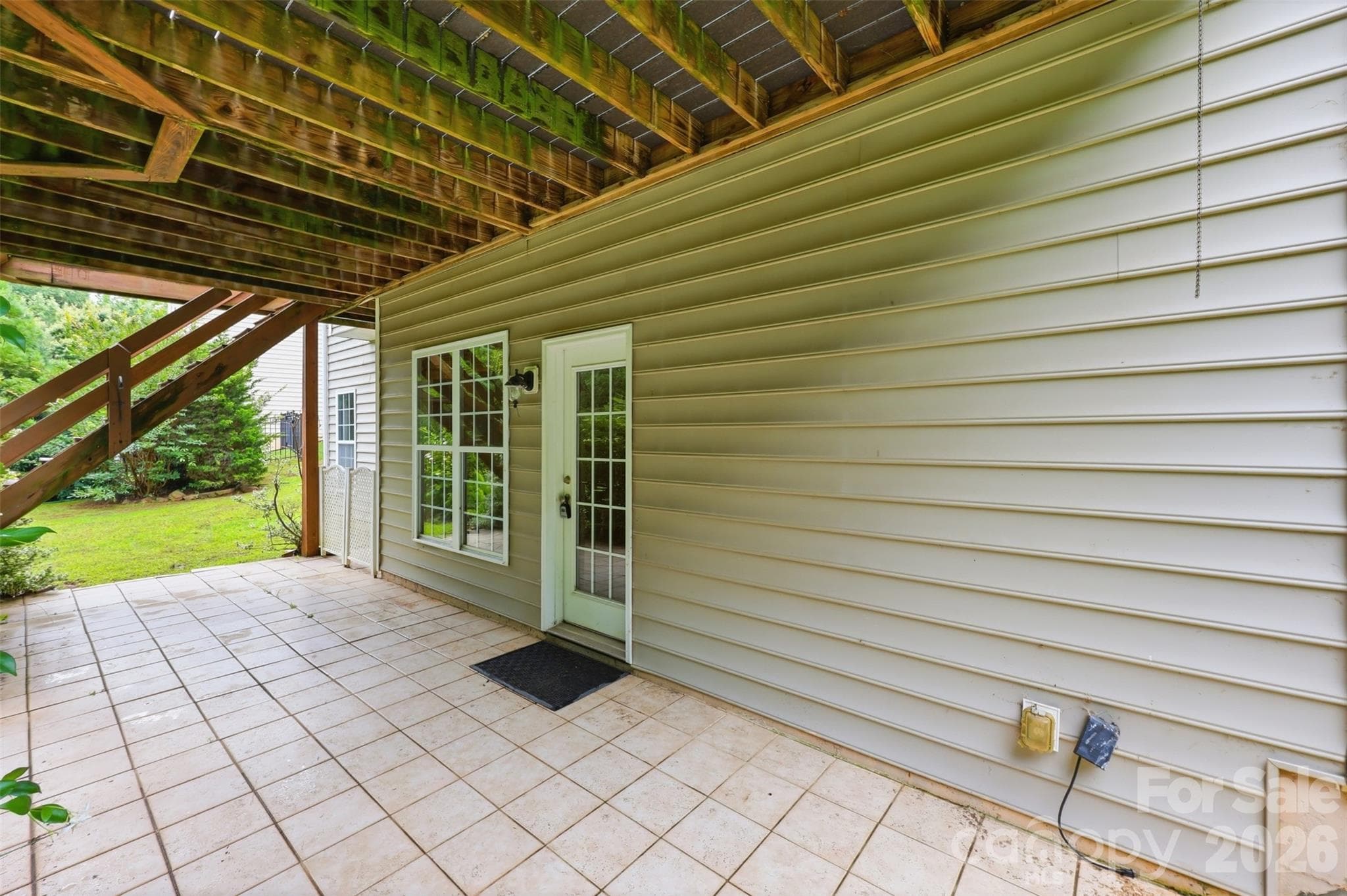 patio outside basement door - 878 Treasure Court, Fort Mill