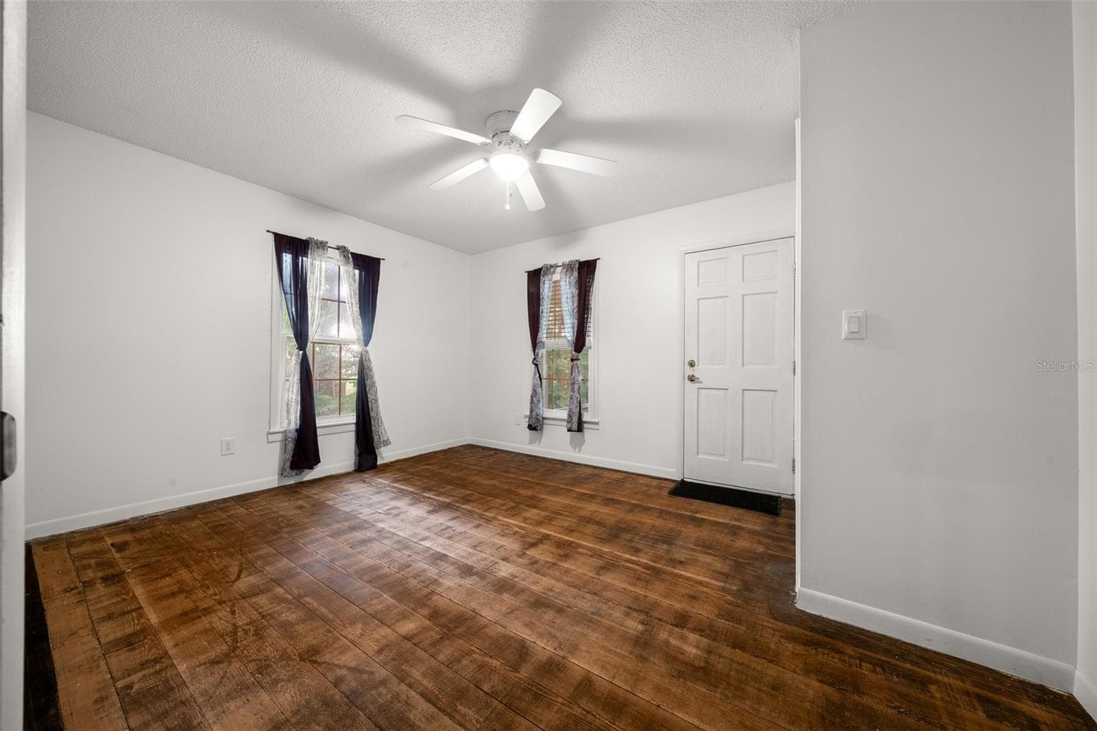 Bed #3 with original wood floors from 1910 - 1985 NE 97TH STREED RD, ANTHONY