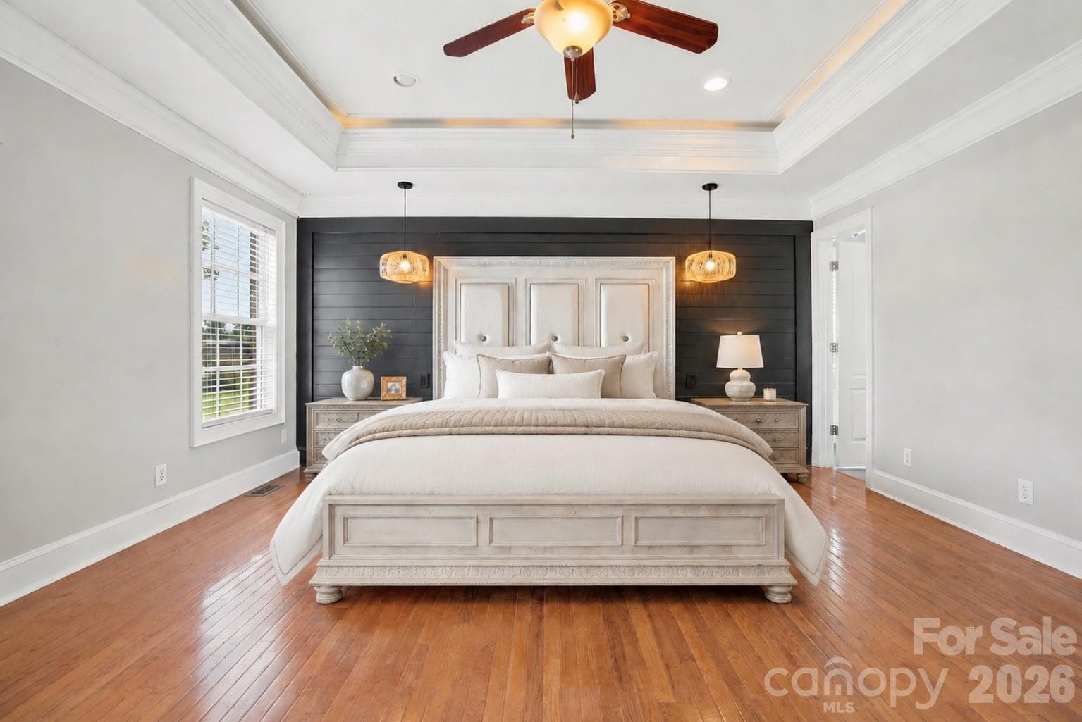 Luxurious primary suite offers impressive scale, elegant finishes, and a private retreat-like atmosphere. - 8520 Stock Horse Trail, Windsor
