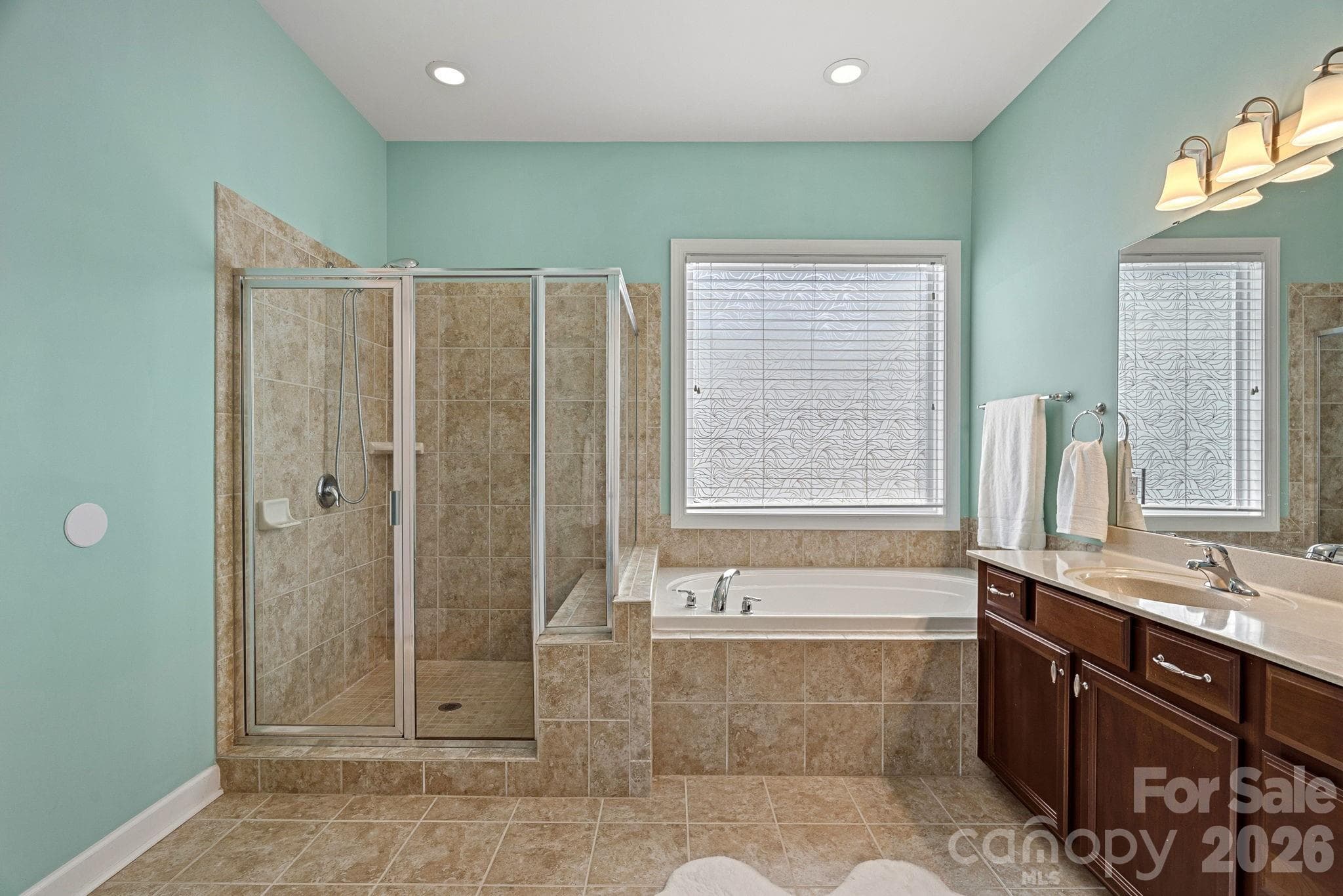 Primary bath with soaking tub and separate shower - Concord