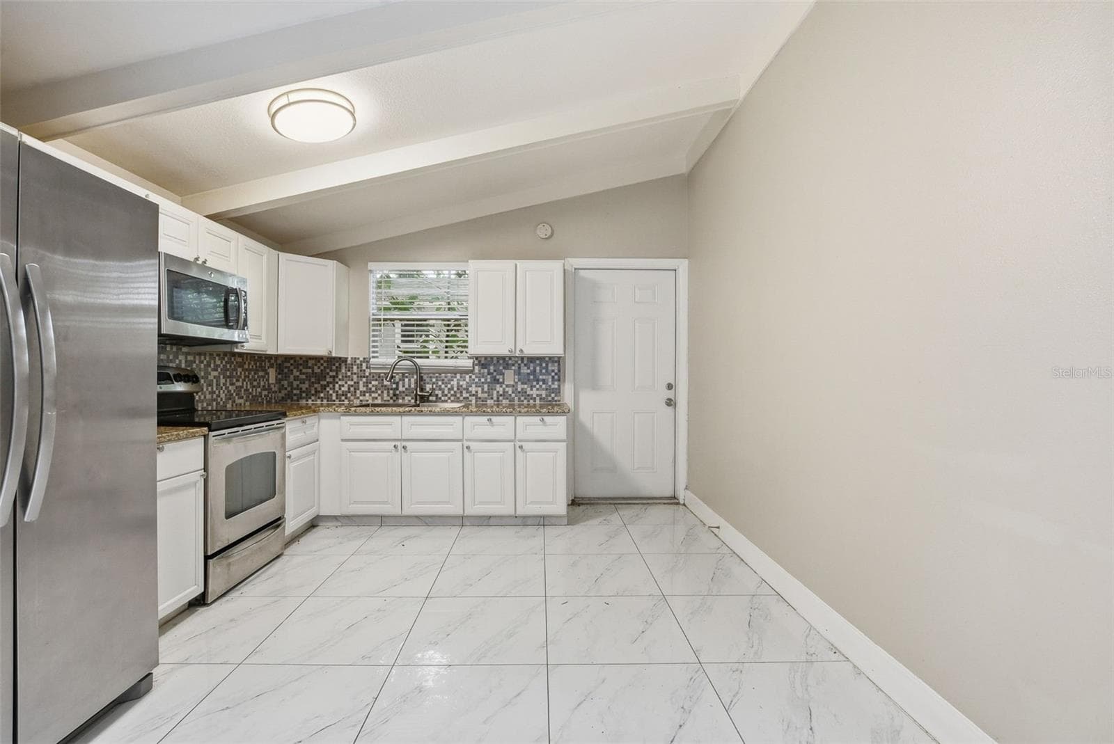 Single Family Residence at 6033 W AMELIA ST, ORLANDO, photo 7 of 32