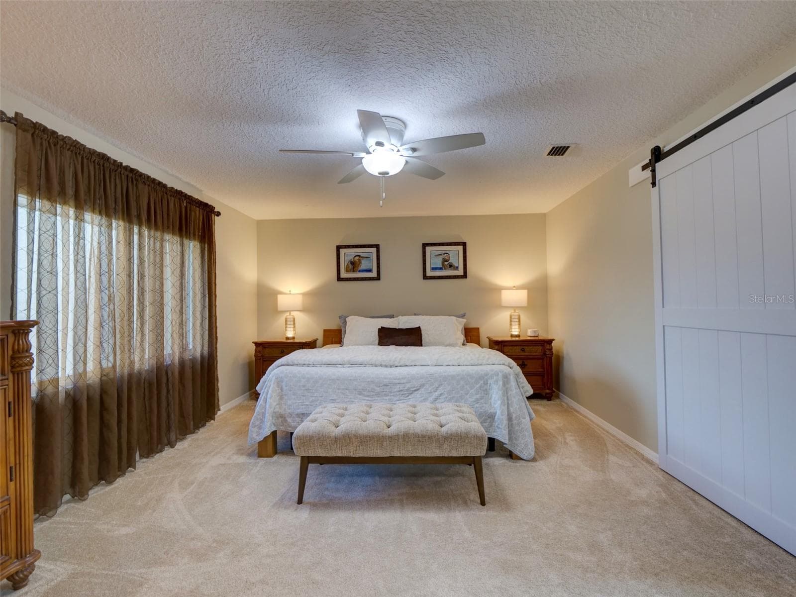 Primary Bedroom: Barn Door Closed - 100 S TREMAIN ST #G2, MOUNT DORA