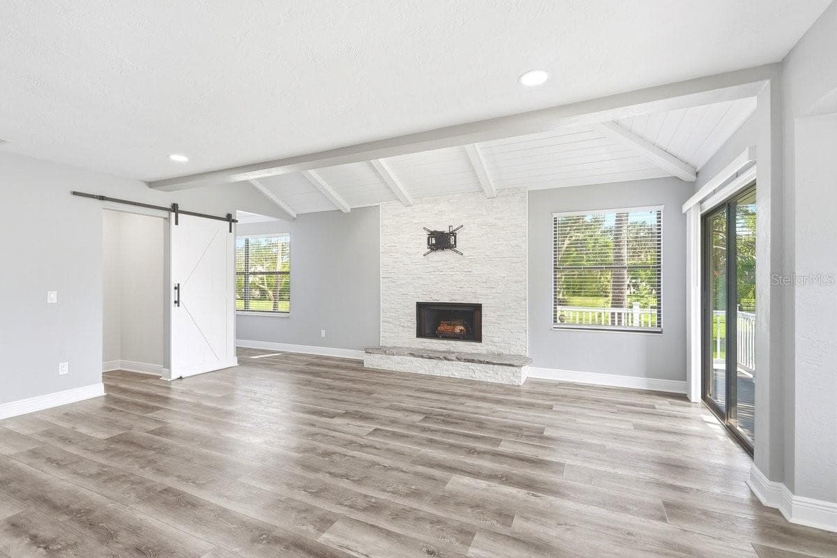 LIVING AND DINING AREA - 105 MCDONALD ST, SOUTH DAYTONA
