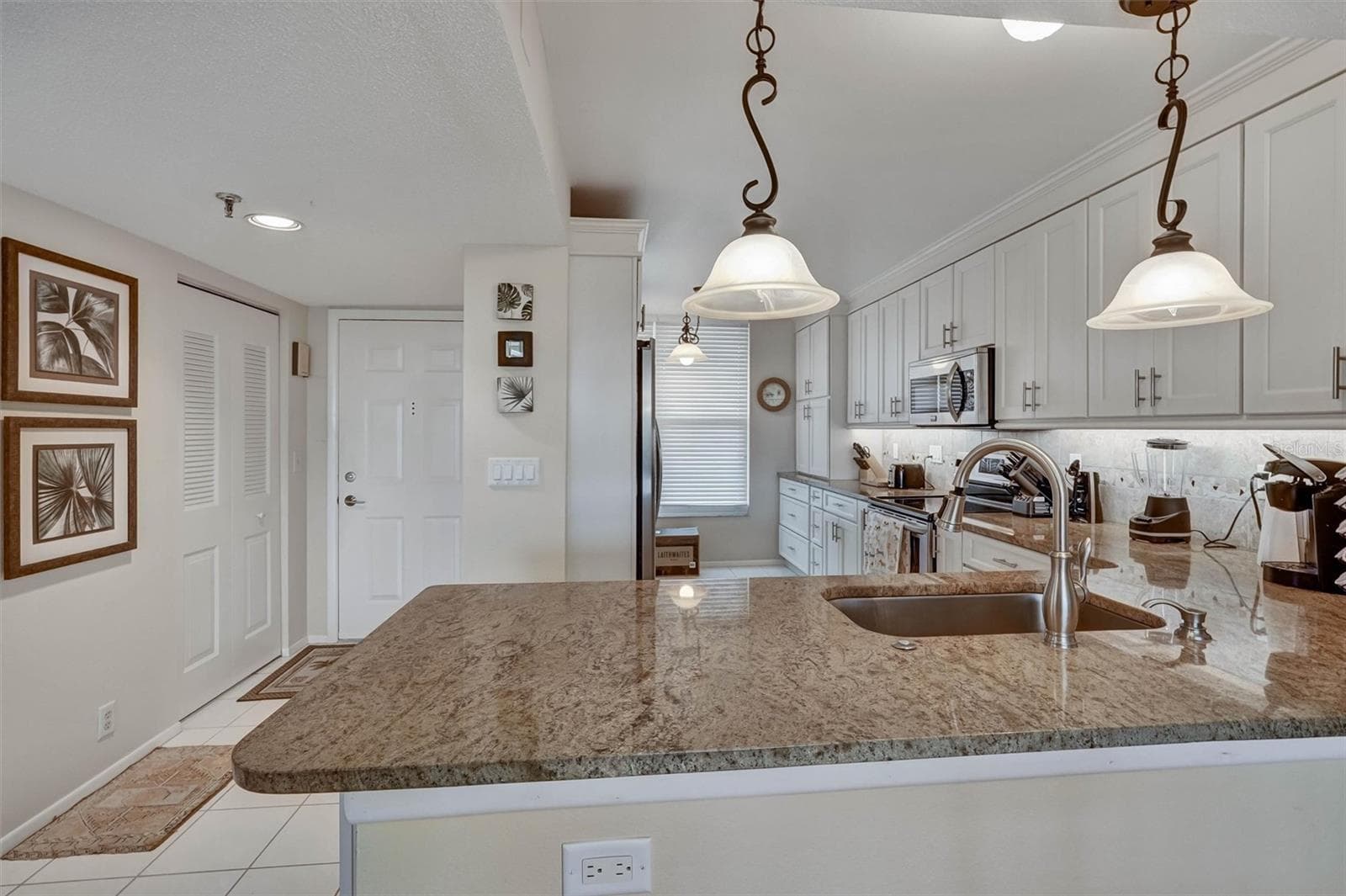 Chef’s kitchen - 4570 PINEBROOK CIRCLE CIR #404, BRADENTON