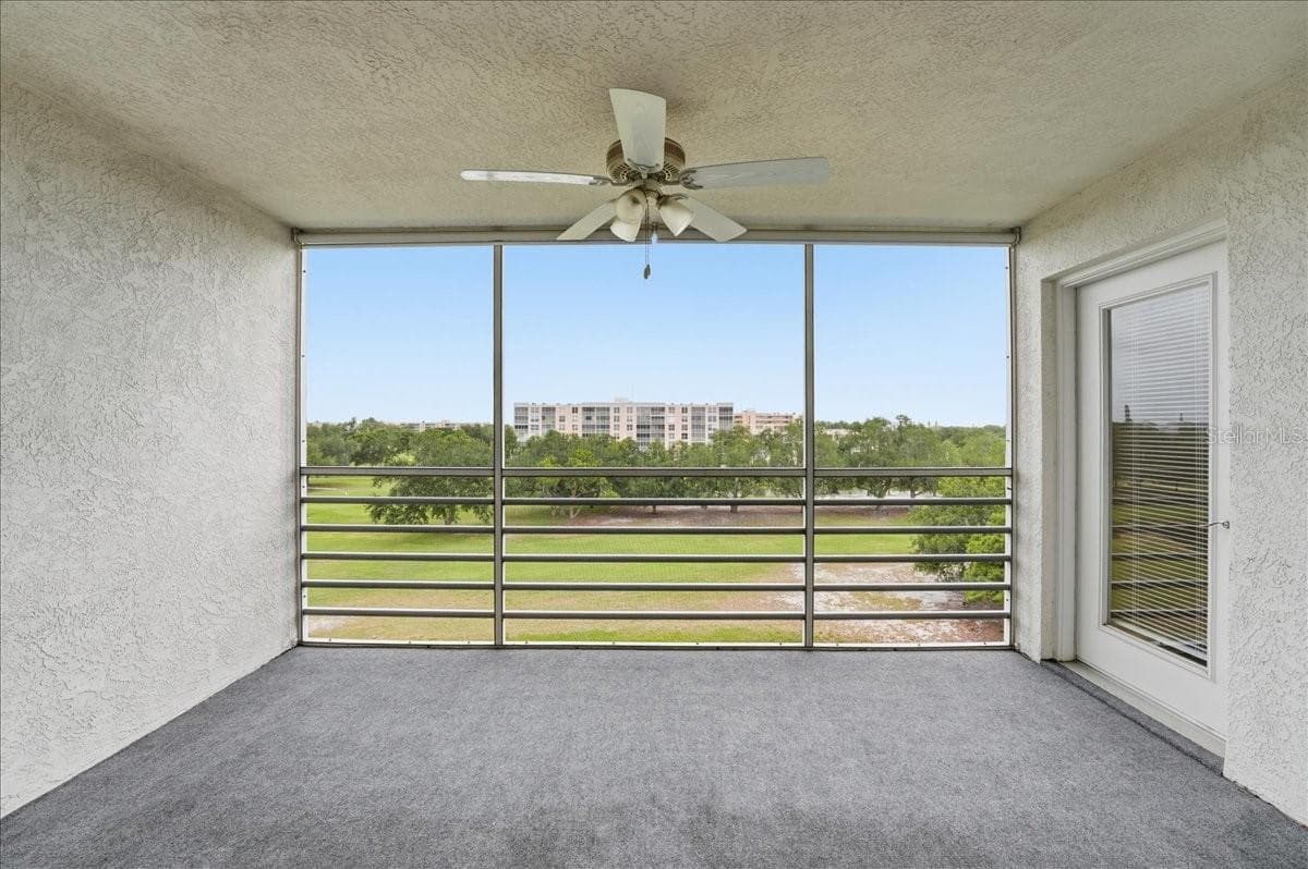 Lanai looking over the 9th green - 4550 PINEBROOK CIR #506, BRADENTON