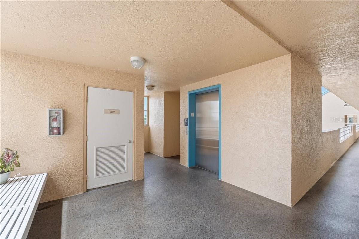 Trash shoot to the left of the elevator - 4550 PINEBROOK CIR #506, BRADENTON