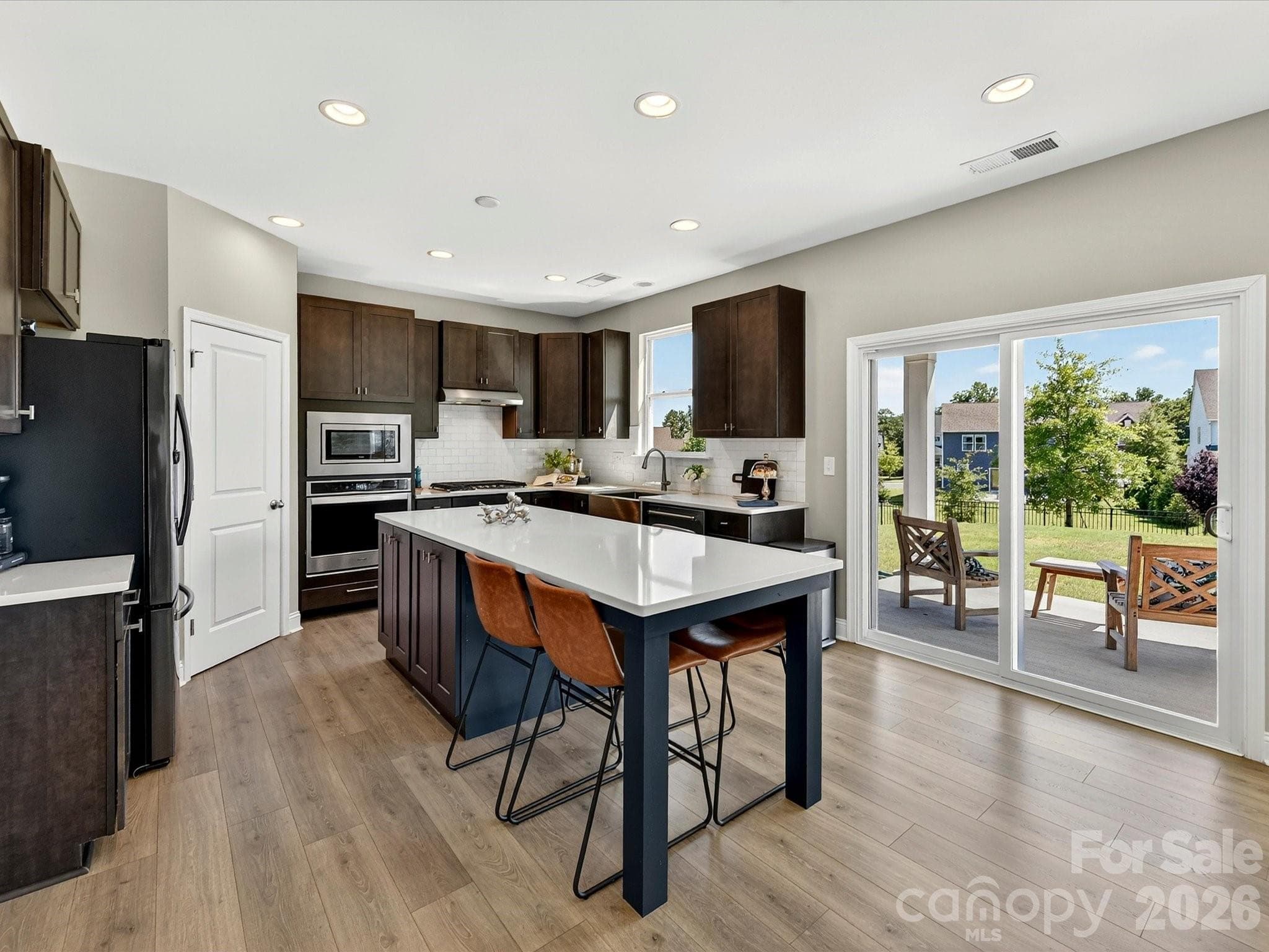 Sellers Redesigned Center Island for Seating and Storage - 6203 Six String Court, Fort Mill