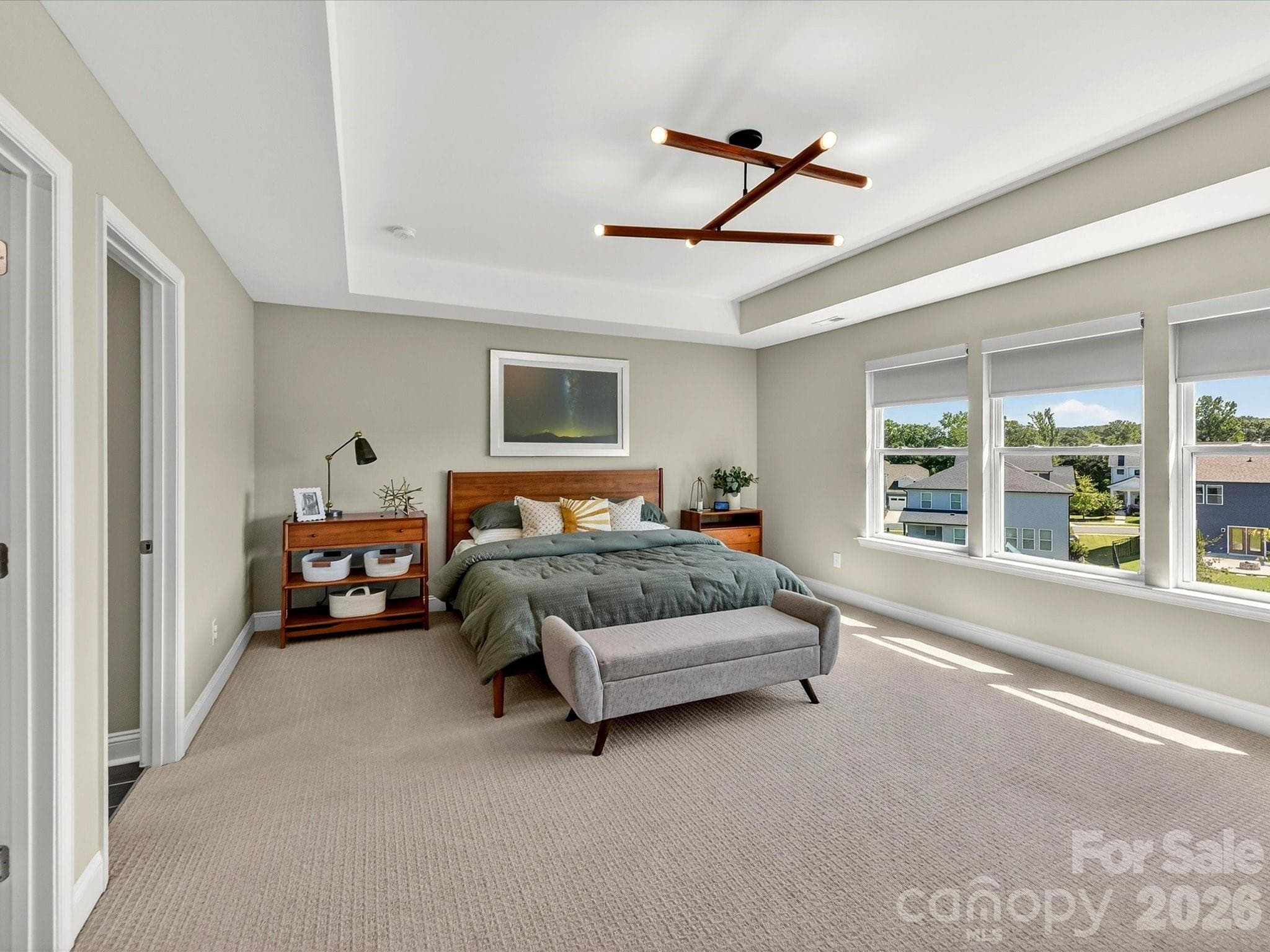 Large Primary Bedroom with Custom Modern Light and Upgraded Carpet - 6203 Six String Court, Fort Mill