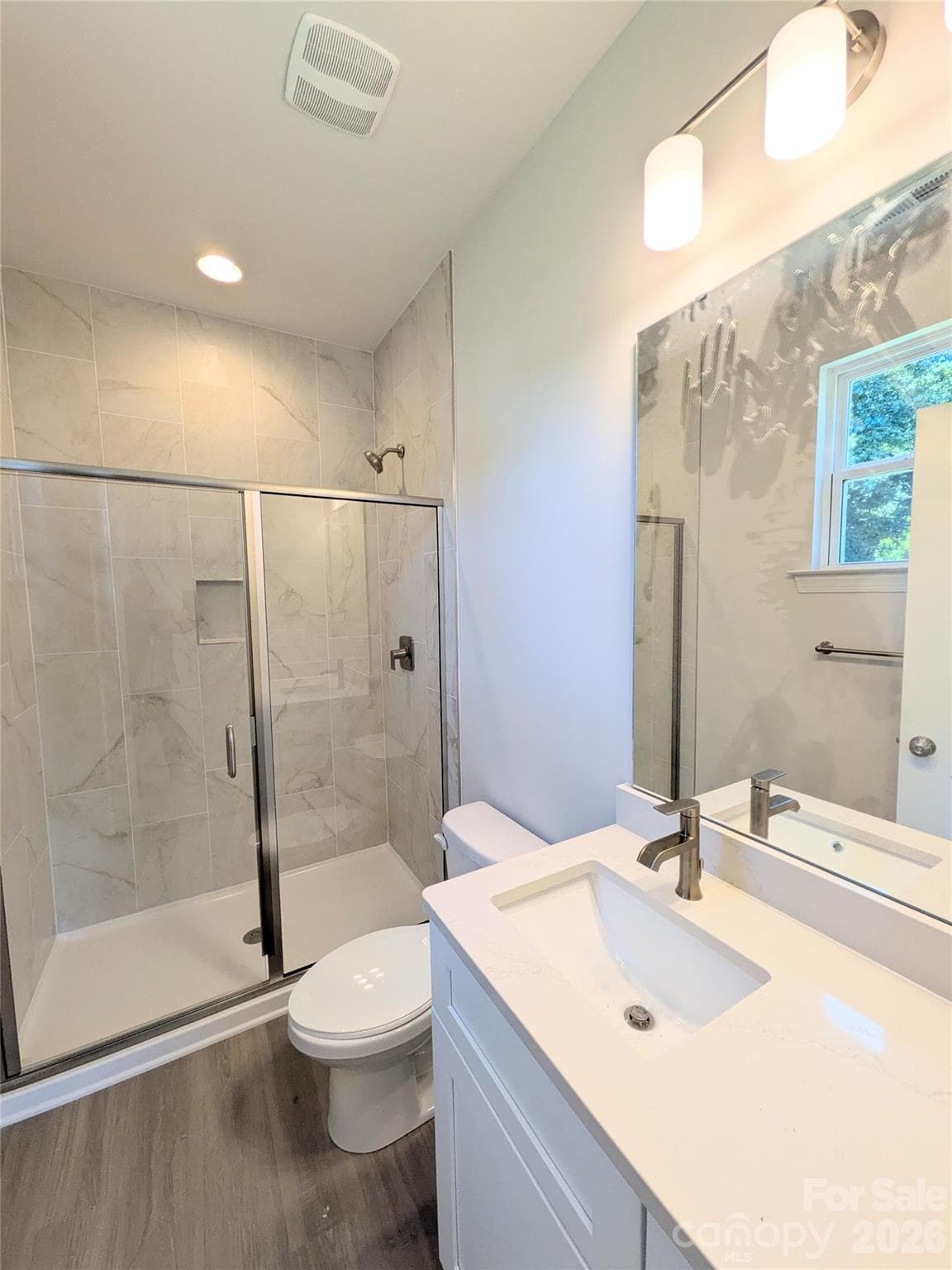 Tiled shower in primary Bedroom - 209 James Street, Kannapolis