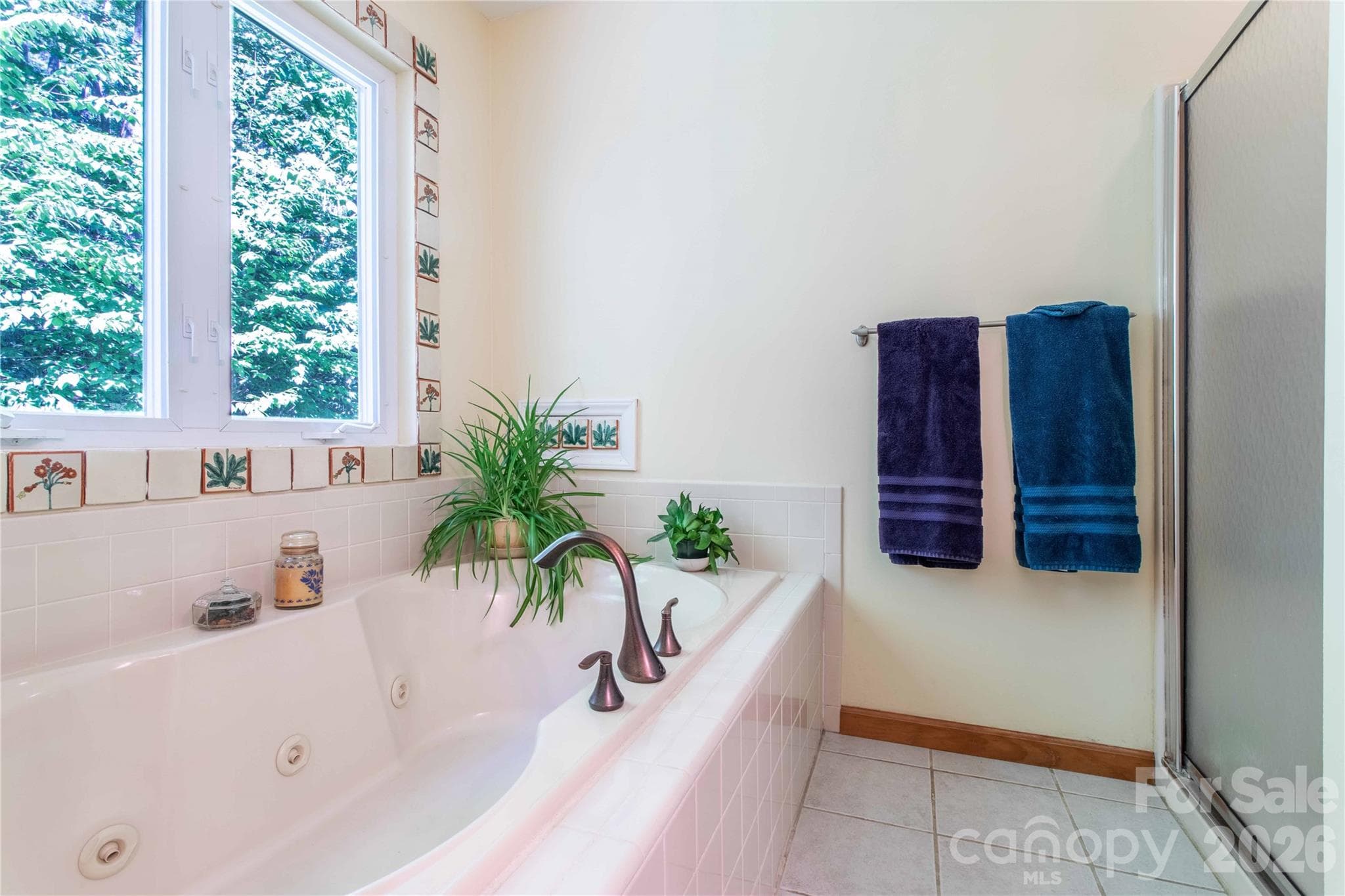 Shower in the primary bath, across from the jetted tub, offers the same spa-like experience. - 22 Great Aspen Way, Black Mountain