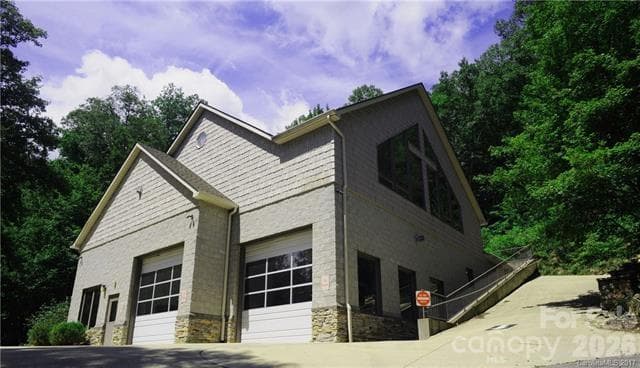 Laurel Ridge offers a fire substation that has the community center above it. - 22 Great Aspen Way, Black Mountain