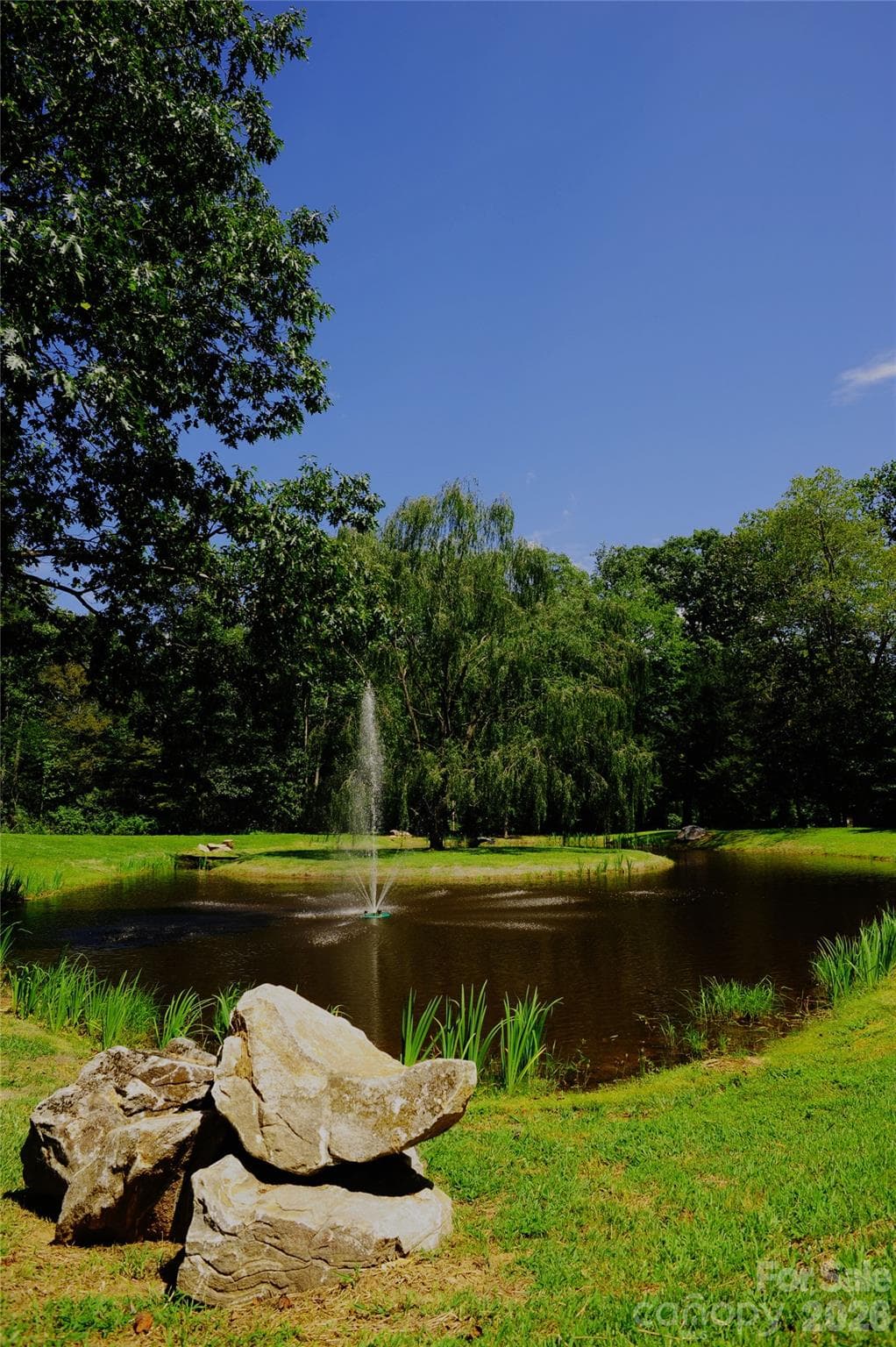 A beautiful fountain on the way to the Laurel Ridge gates. - 22 Great Aspen Way, Black Mountain