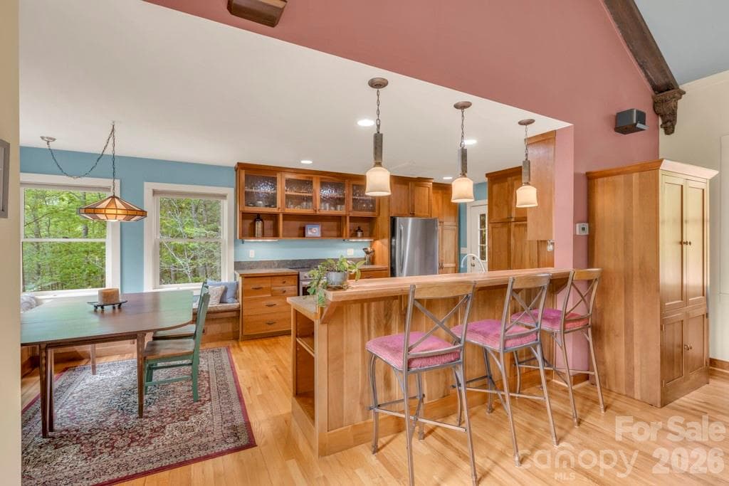 Main-level kitchen & dining, with bar seating, open to the living space! - 1590 Shulls Mill Road, Boone