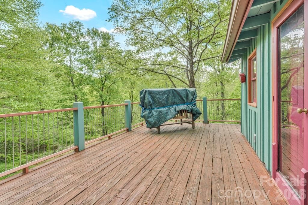 Deck area off of main-level bedroom suite, summer view - 1590 Shulls Mill Road, Boone