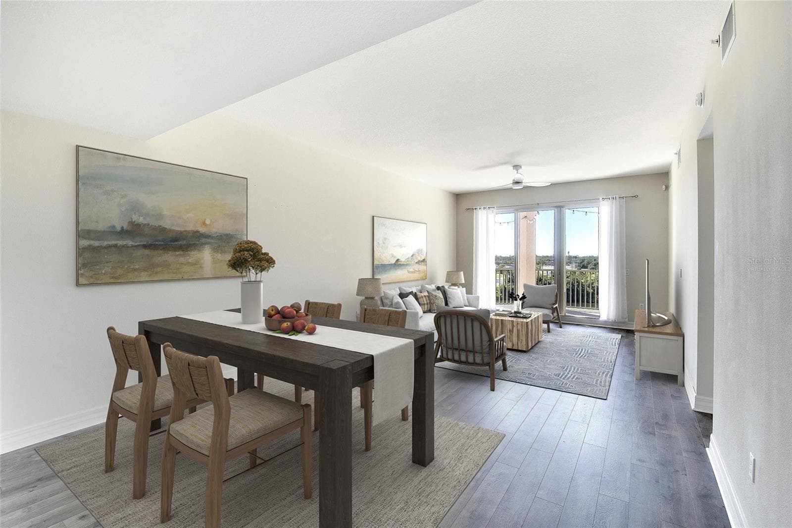 Virtually Staged Living Room looking out to the water - 1921 MONTE CARLO DR #603, SARASOTA