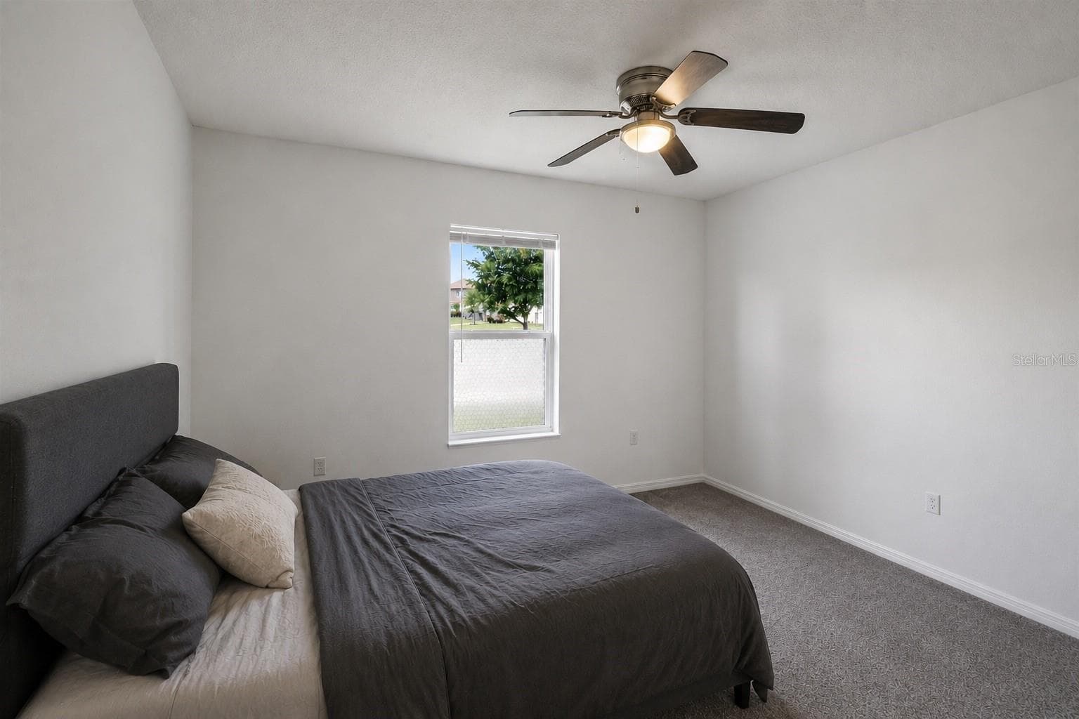 Main floor bedroom. - 2082 FICUS ST, MASCOTTE