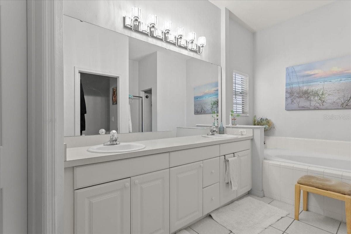 Primary bathroom dual vanity - 5514 NW 78TH LN, GAINESVILLE
