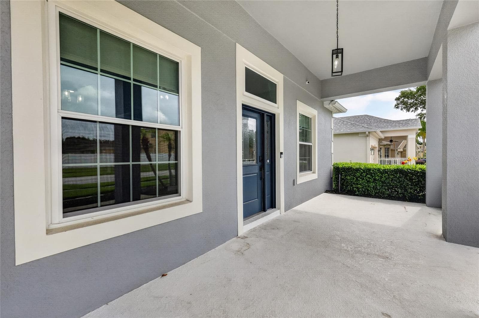 A front porch with southern hospitality ~ - 5006 RISHLEY RUN WAY, MOUNT DORA