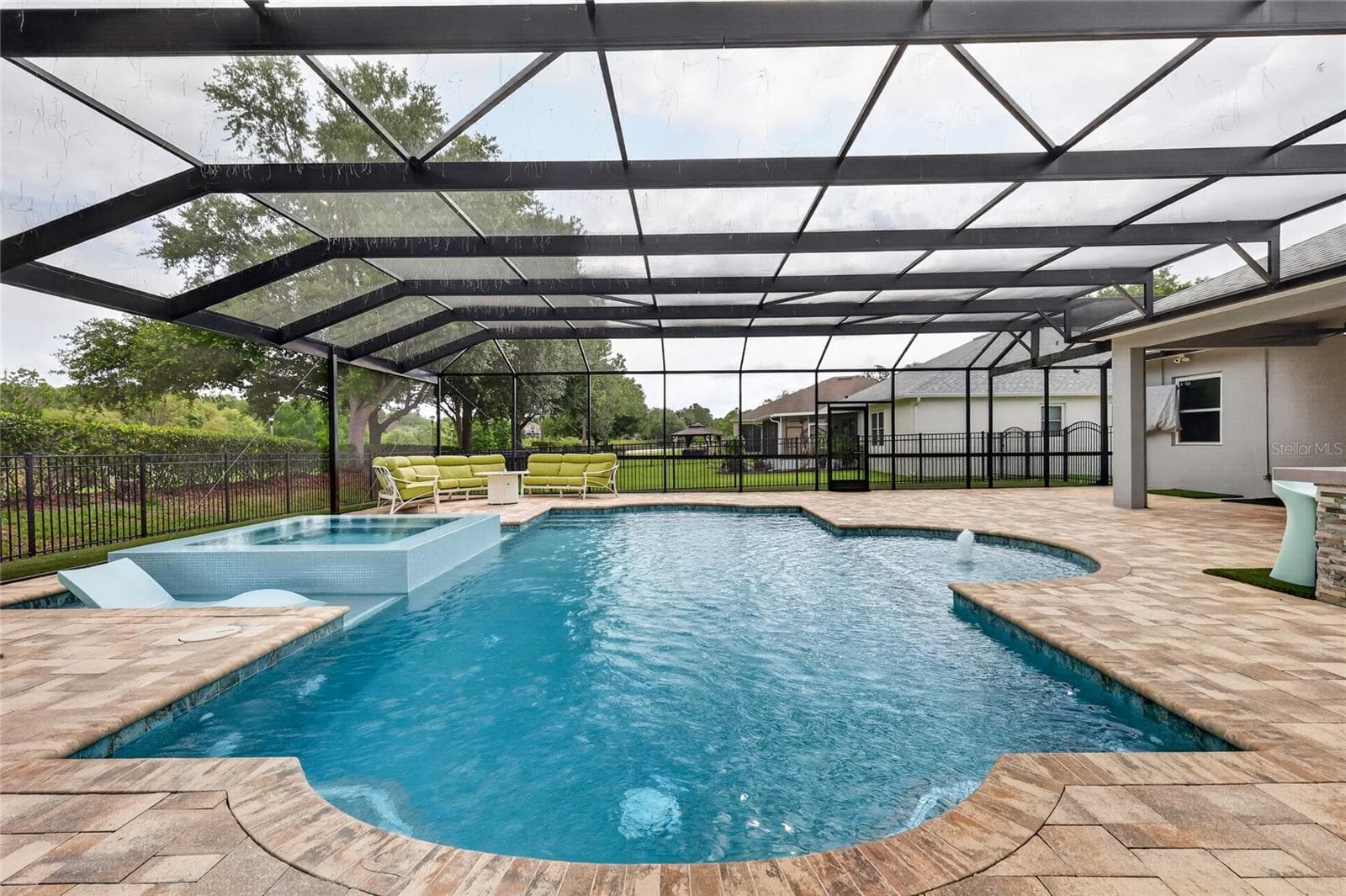 Pool is 16' x 34' with glow in the dark toe tile for evening swims ~ - 5006 RISHLEY RUN WAY, MOUNT DORA