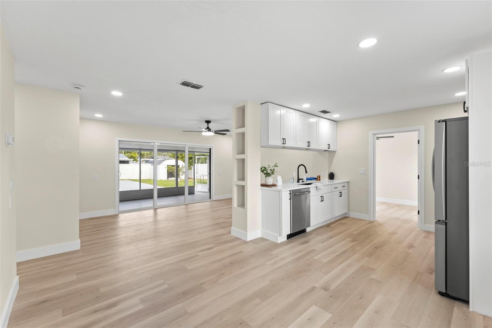 Kitchen/dining area open to living room - 4430 CARSON ST NE, ST PETERSBURG