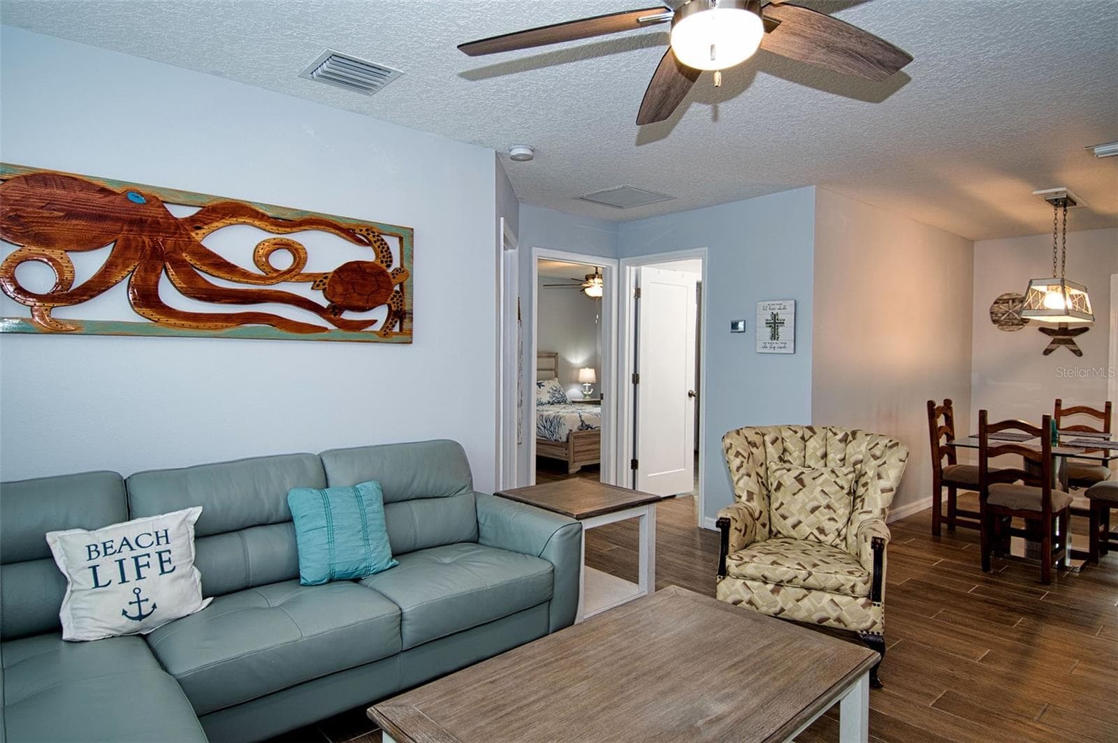 Relax and stretch out in this open Living Room space. - 6420 BOATYARD DR, HUDSON